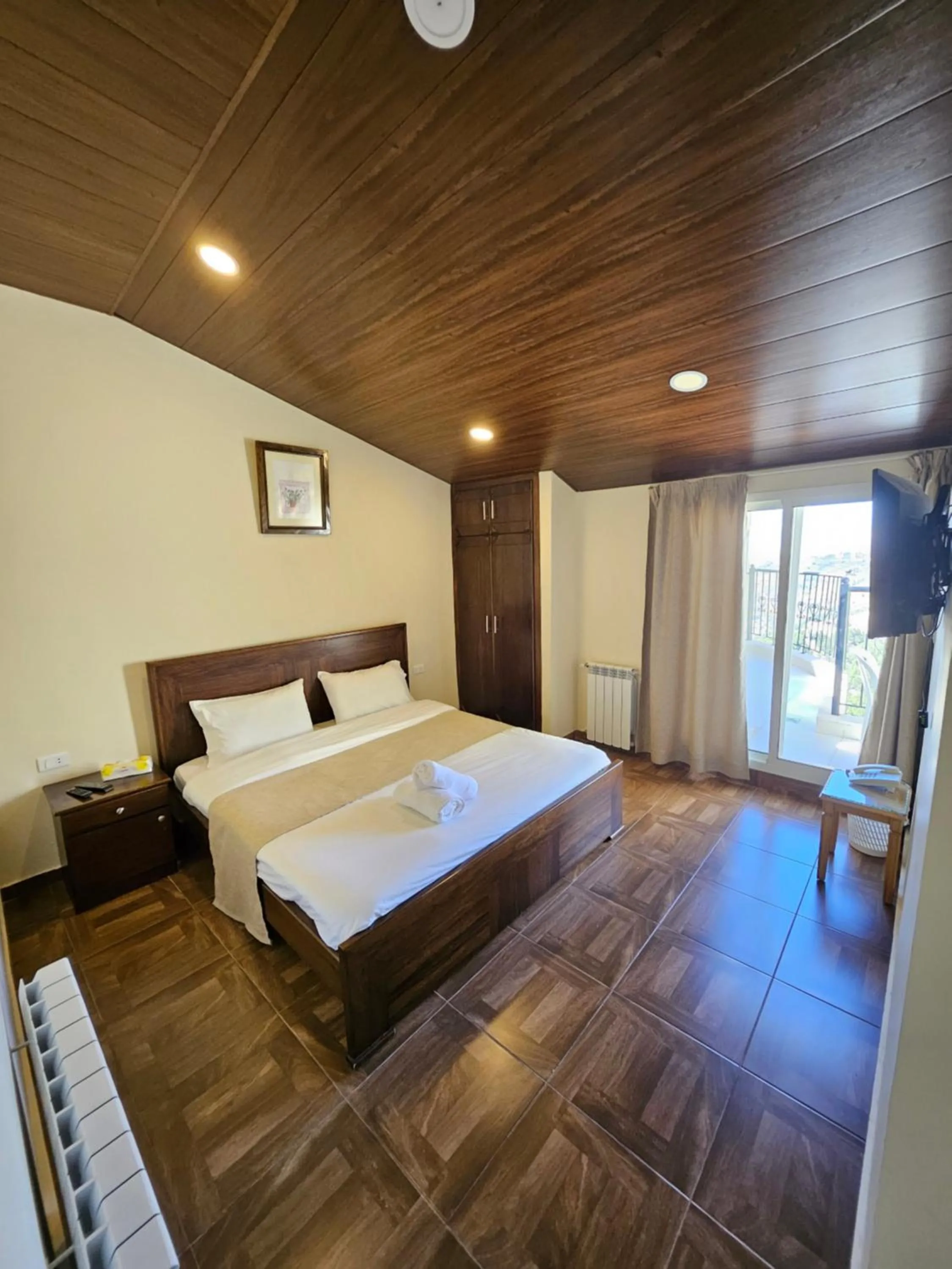 Bed in Hotel L'Aiglon