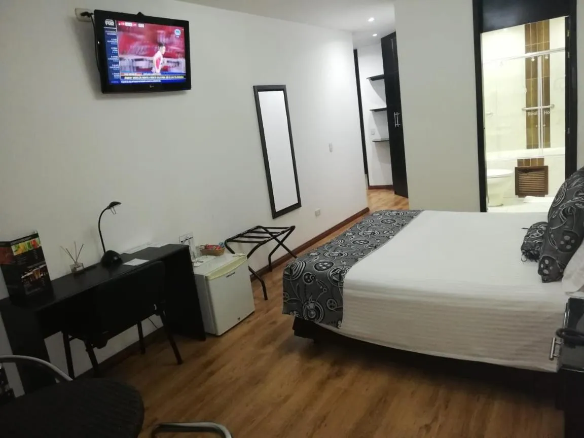 Photo of the whole room, Bed in Hotel Santafe Real