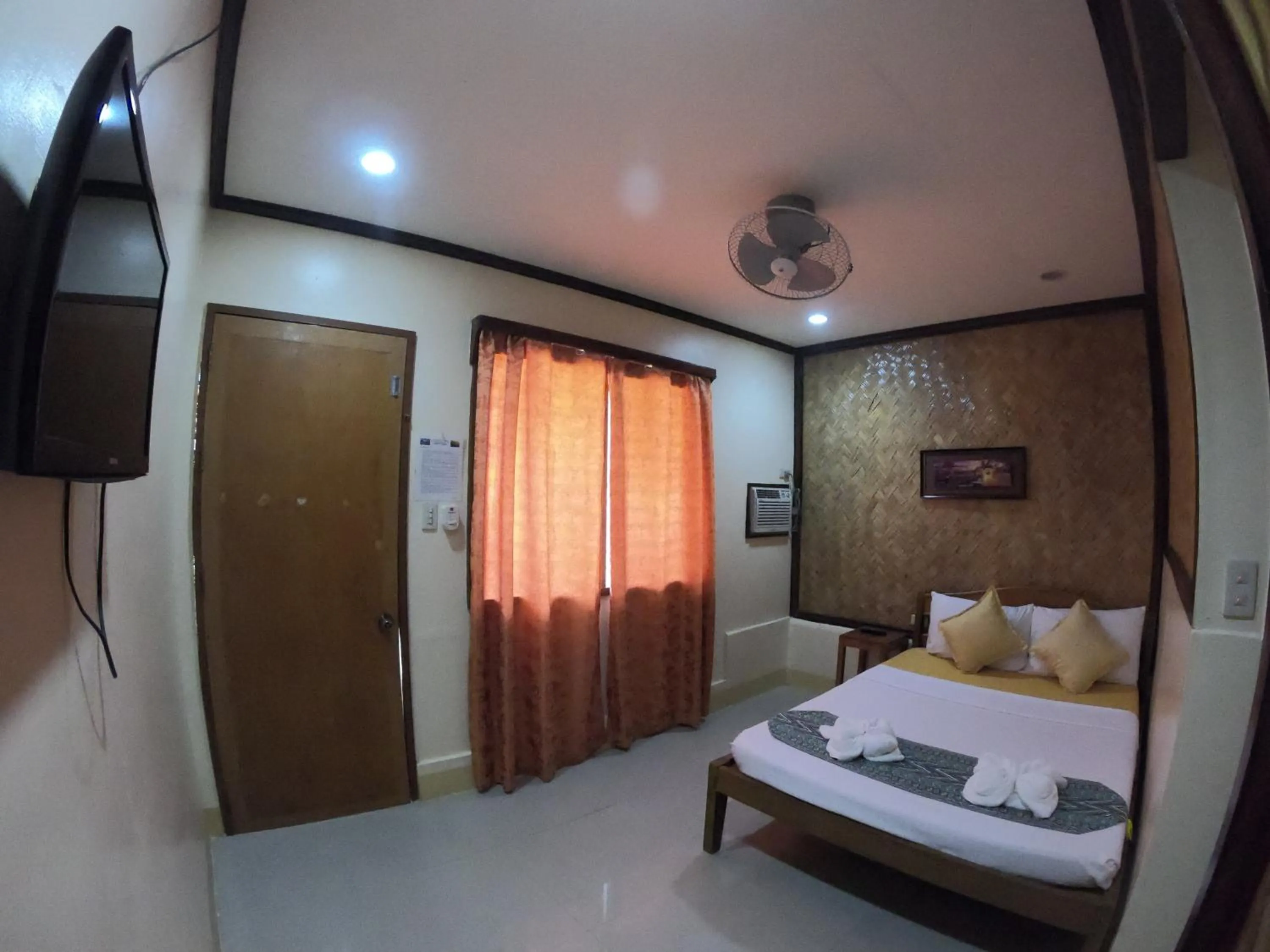 Bed in Telesfora Beach Cottage