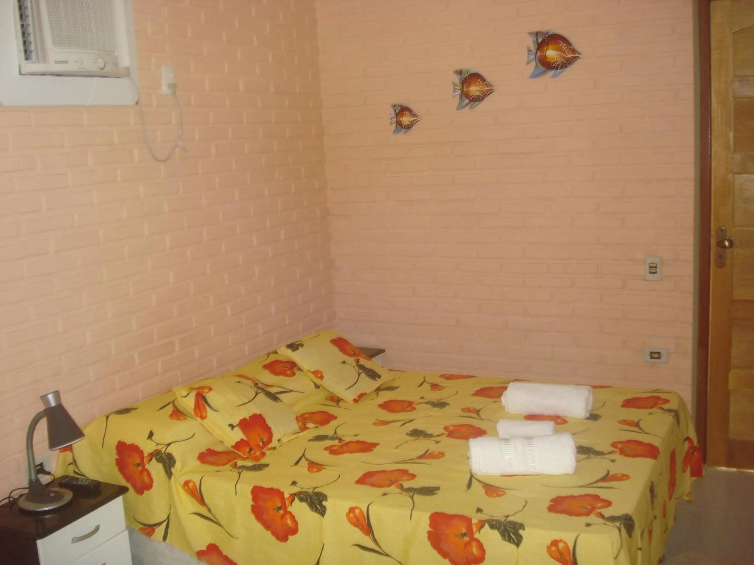 Bed in Pousada Recanto da Preguiça