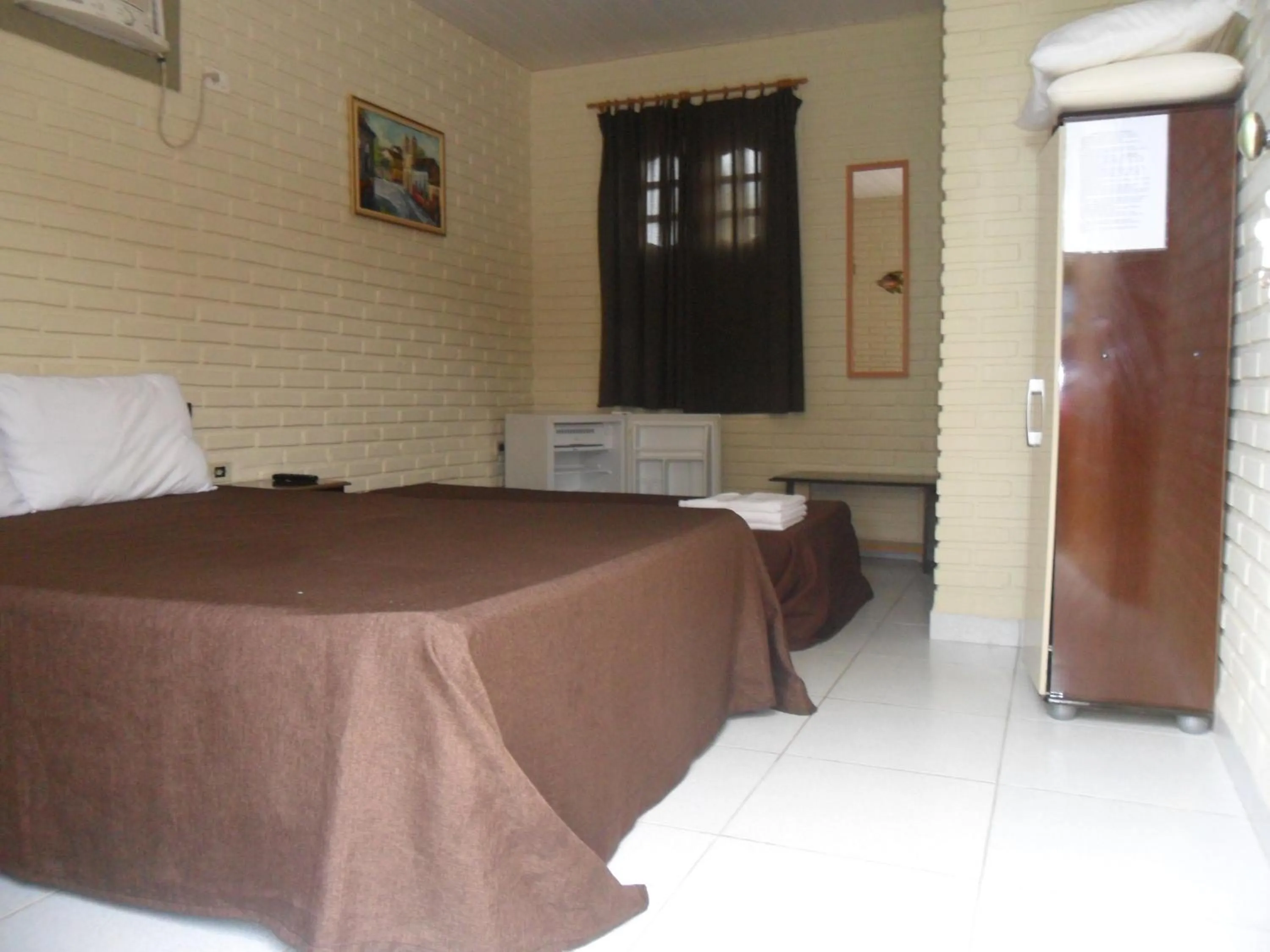 Property building, Bed in Pousada Recanto da Preguiça