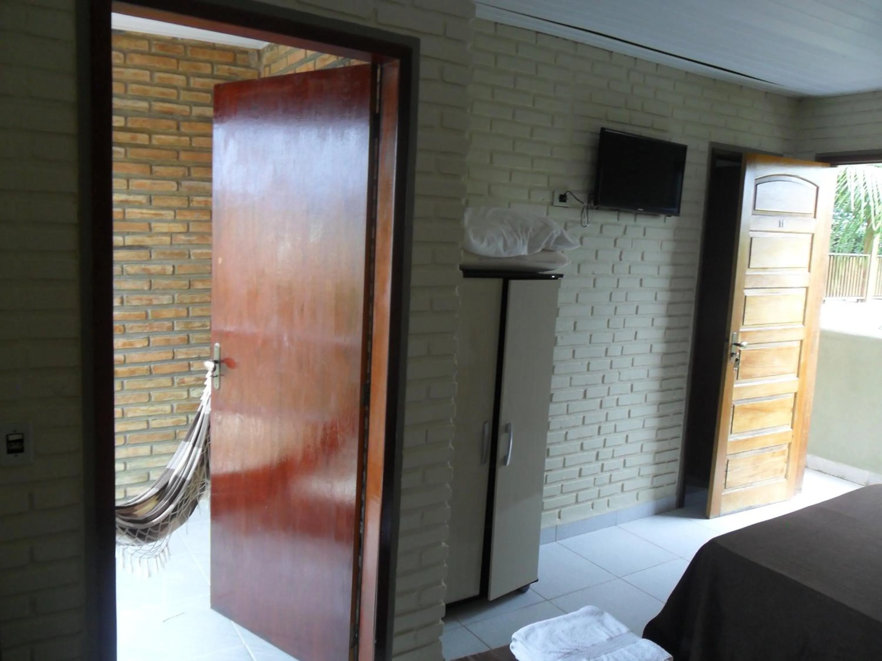 Property building, Bed in Pousada Recanto da Preguiça