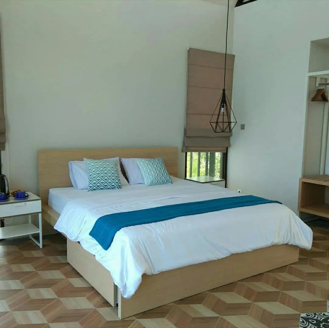 Bed in Radika Paradise Villa & Cottage