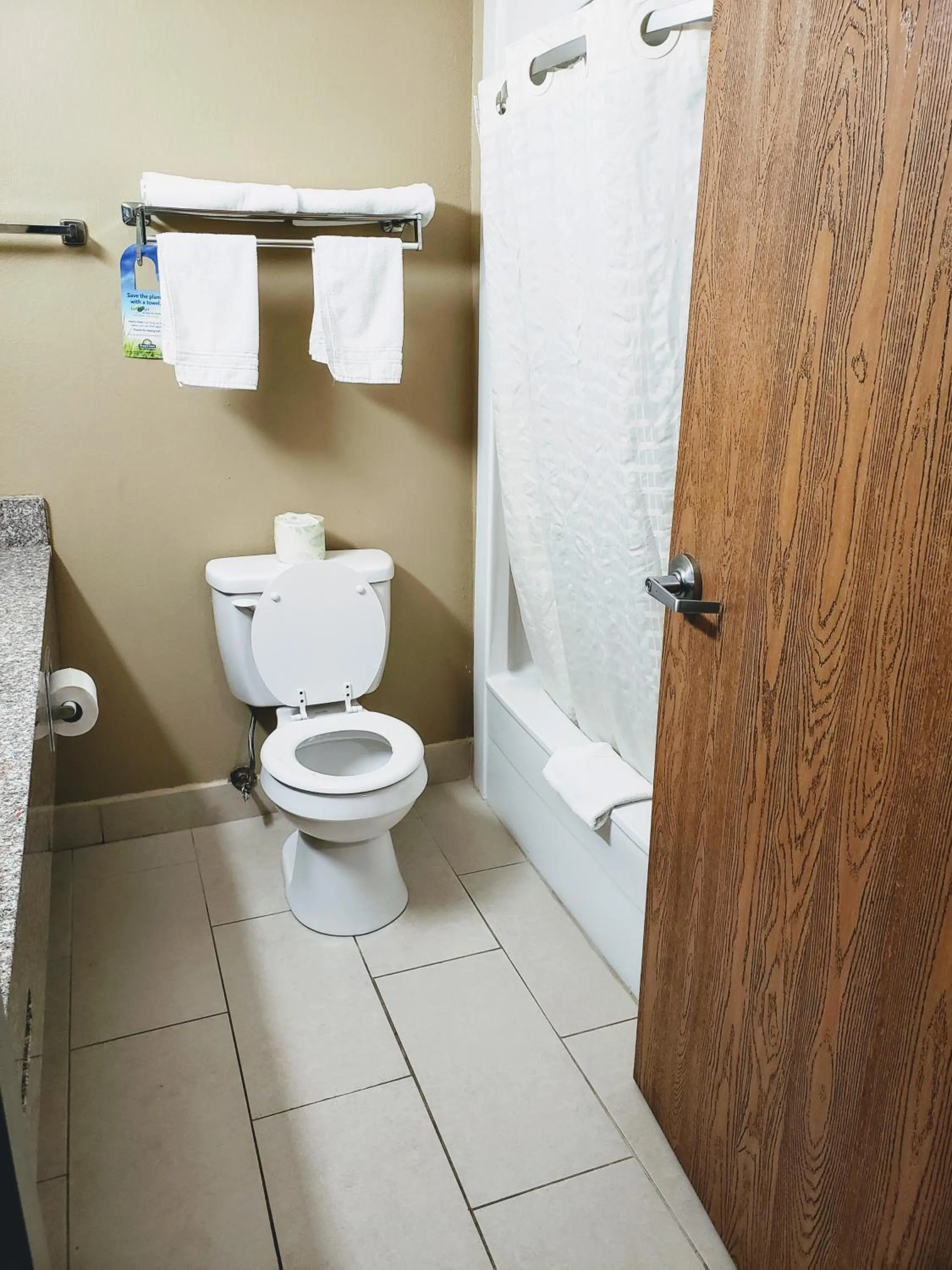 Bathroom in Days Inn & Suites by Wyndham Morris I-80