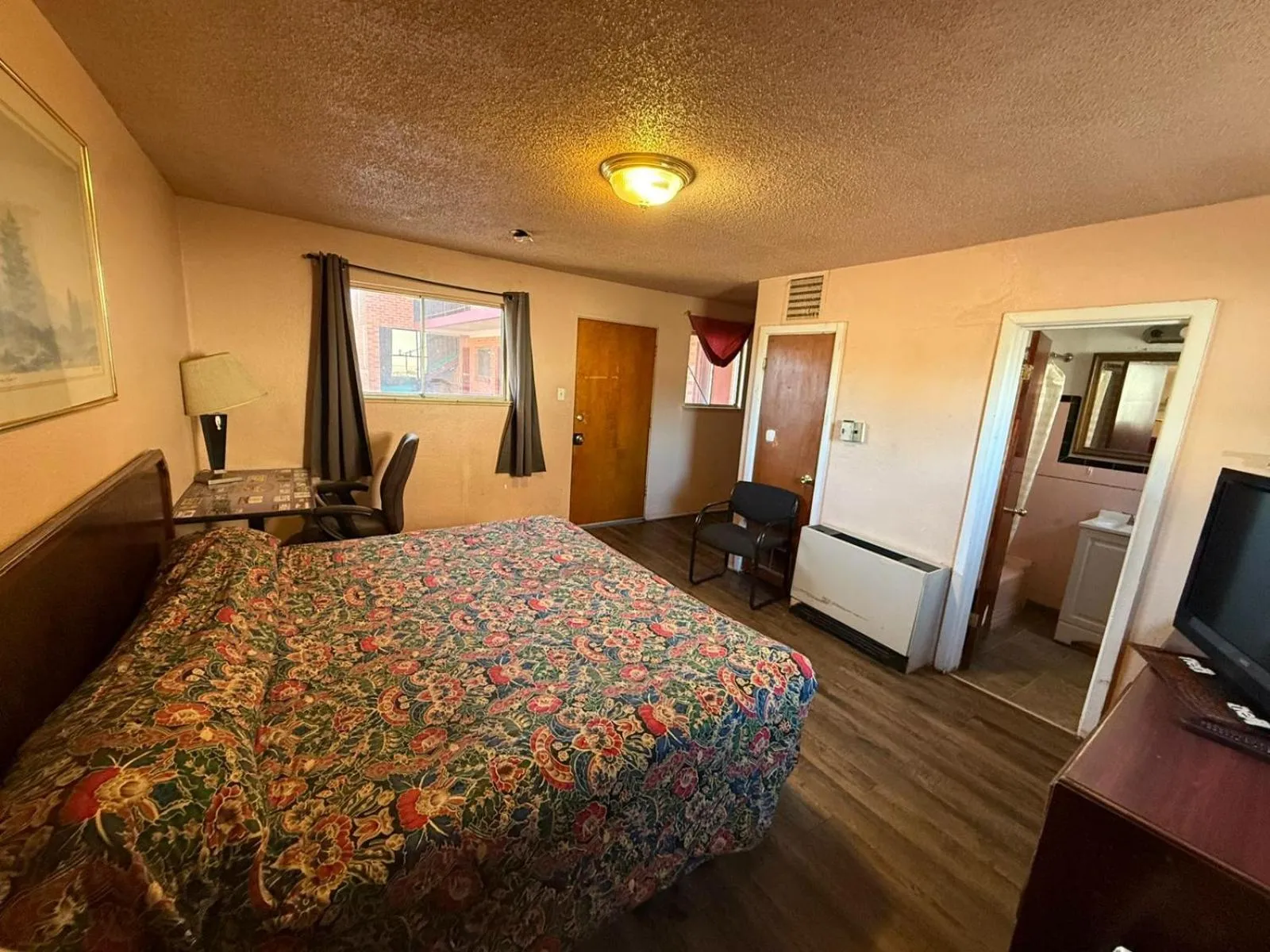 Bedroom, Bed in Springs Inn by Capital O I 25