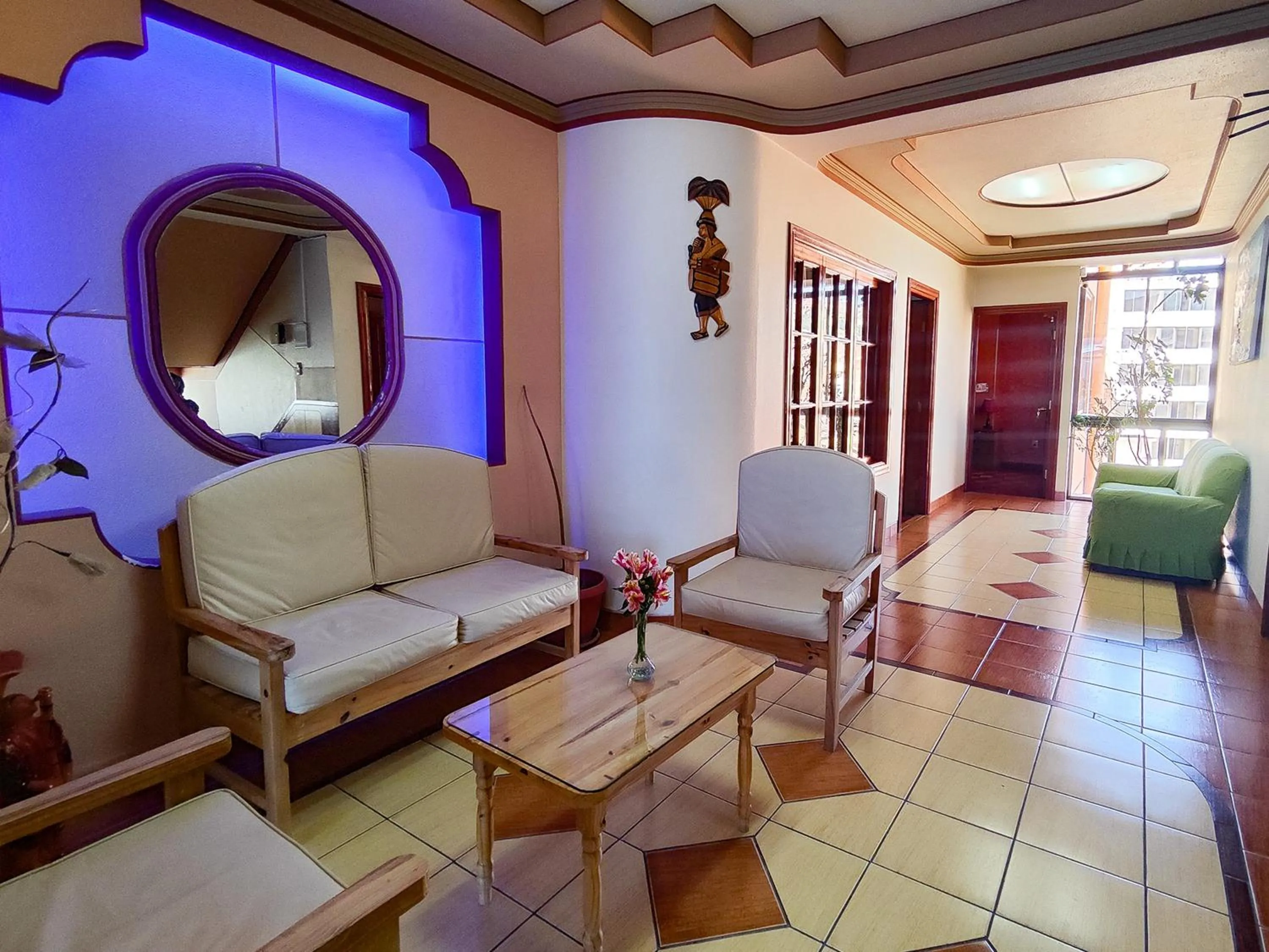 Living room in Hotel Diamante Azul