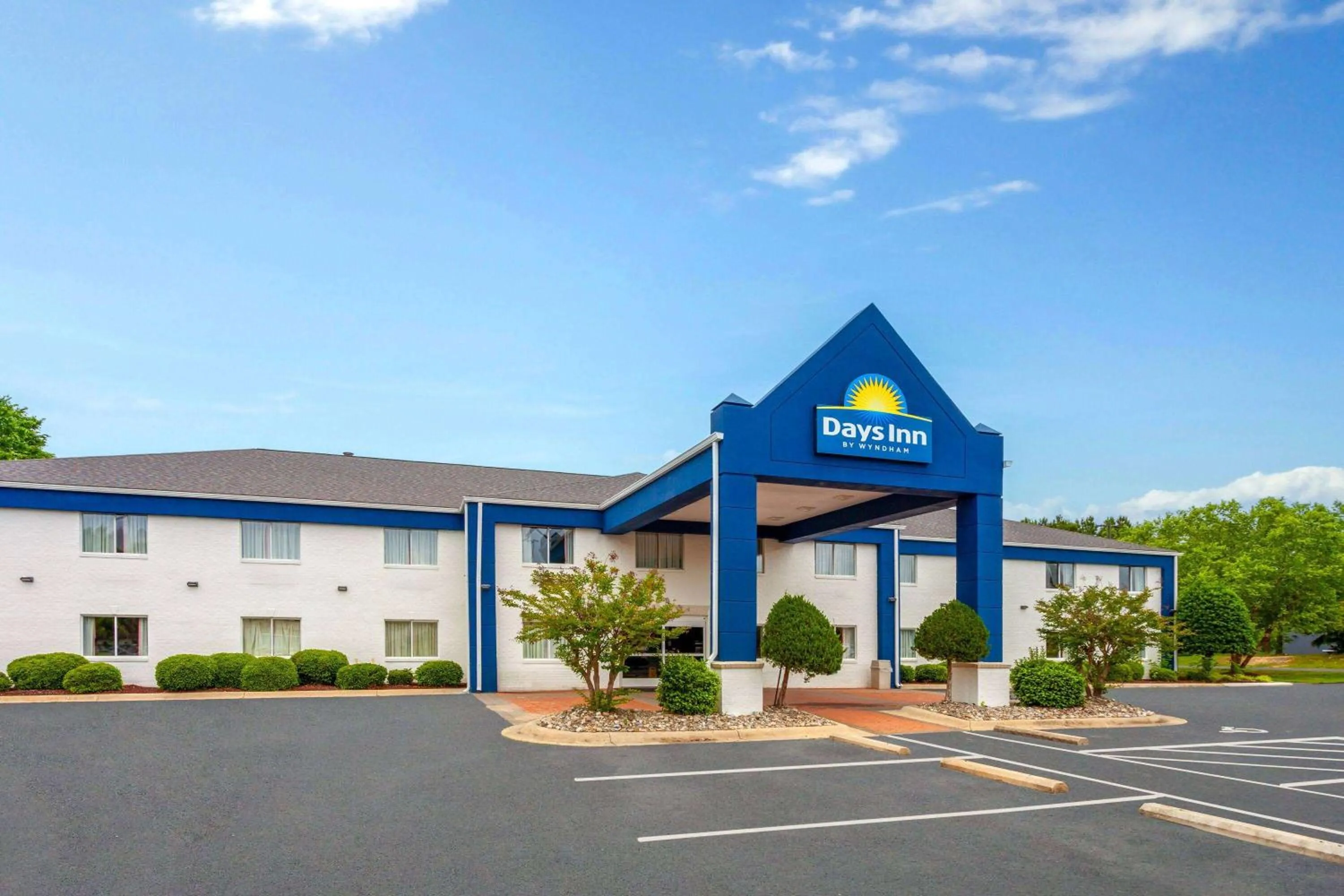 Property building in Days Inn & Suites by Wyndham Siler City
