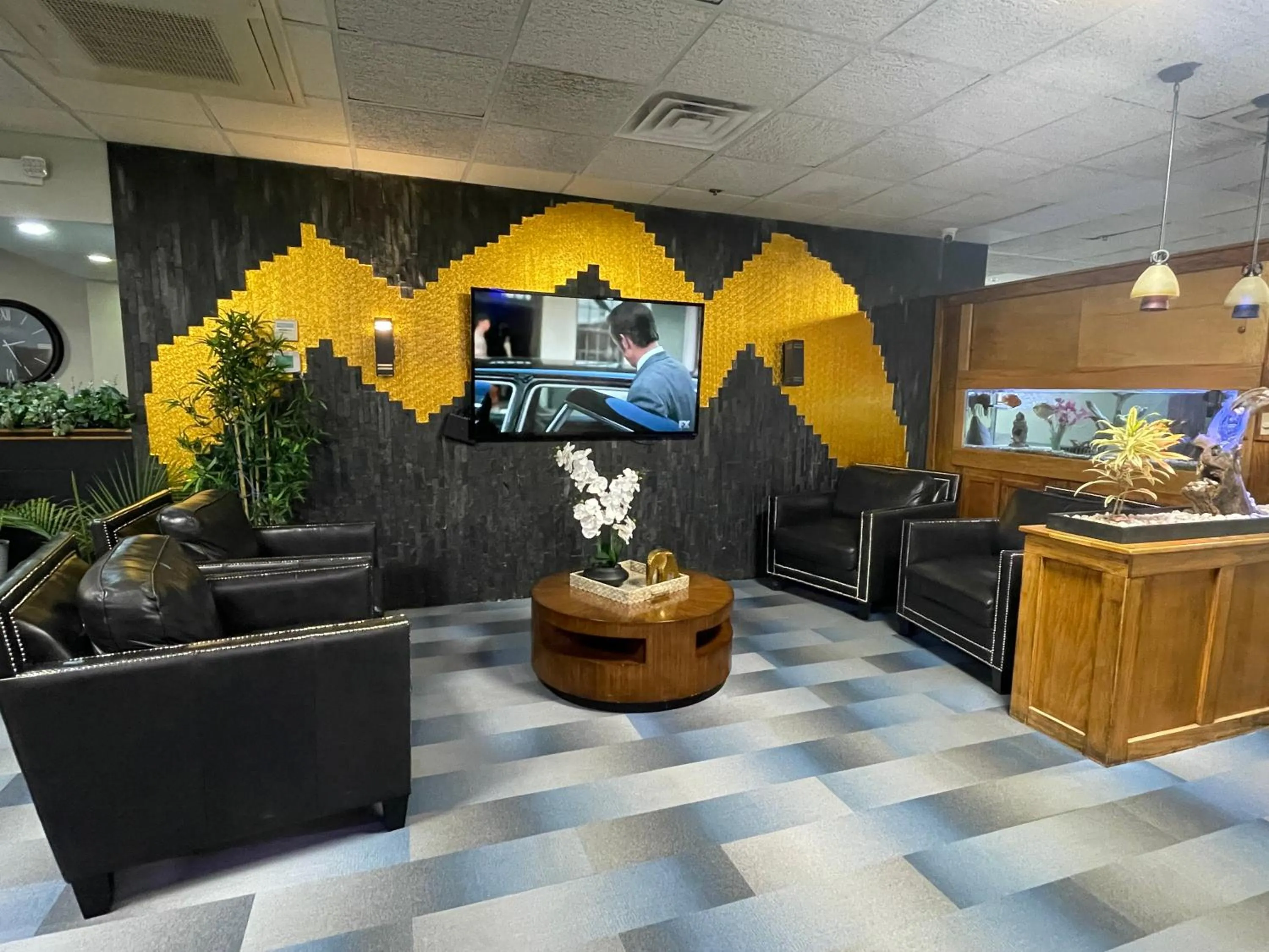 Communal lounge/ TV room in Quality Inn Conference Center Logansport