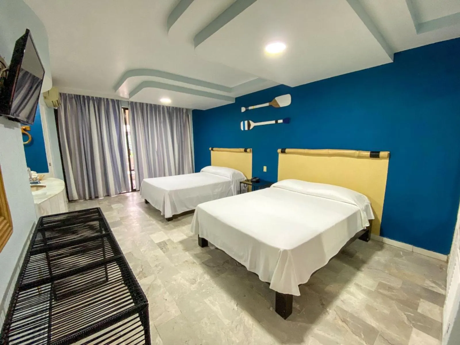 Bed in Acamar Beach Resort