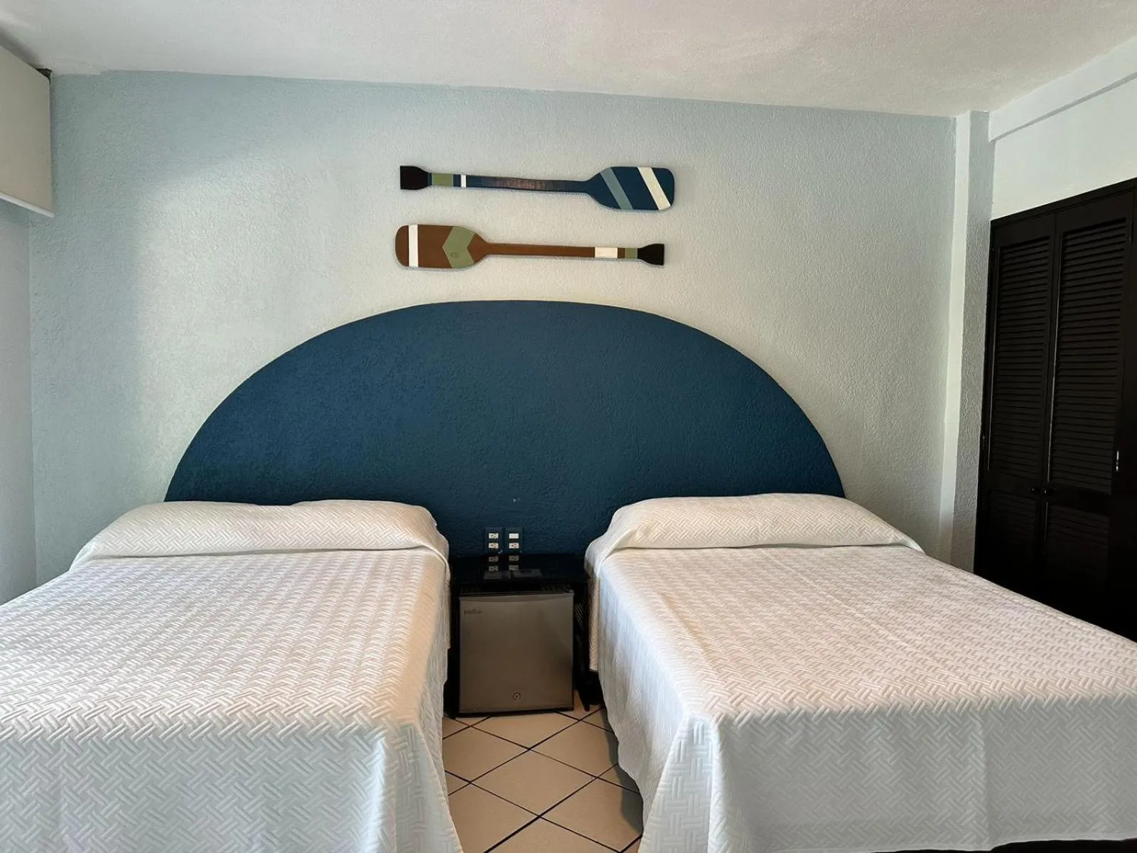 Bed in Acamar Beach Resort