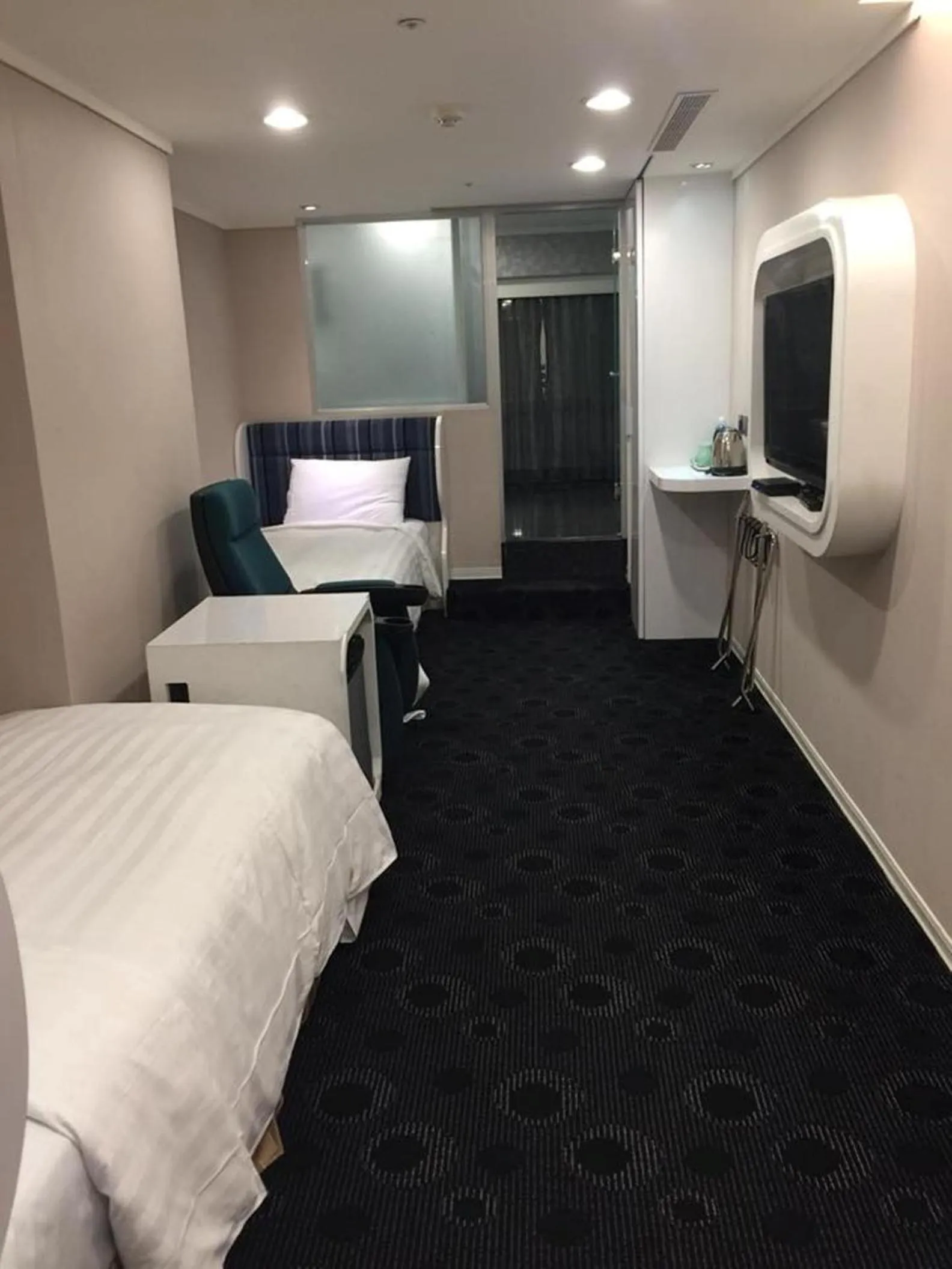 Bed in Ximen Airline Hotel