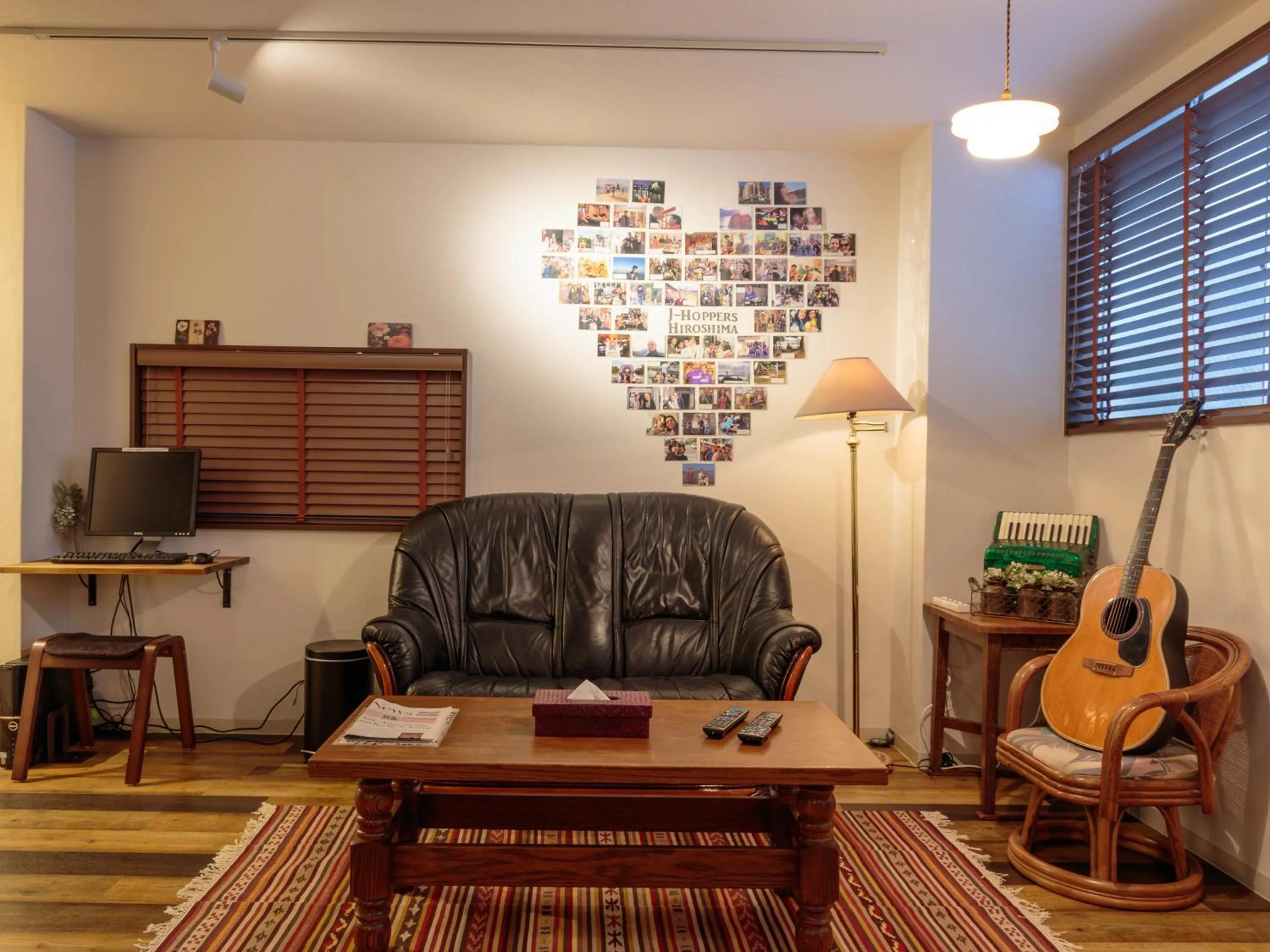 Communal lounge/ TV room in J-Hoppers Hiroshima Guesthouse
