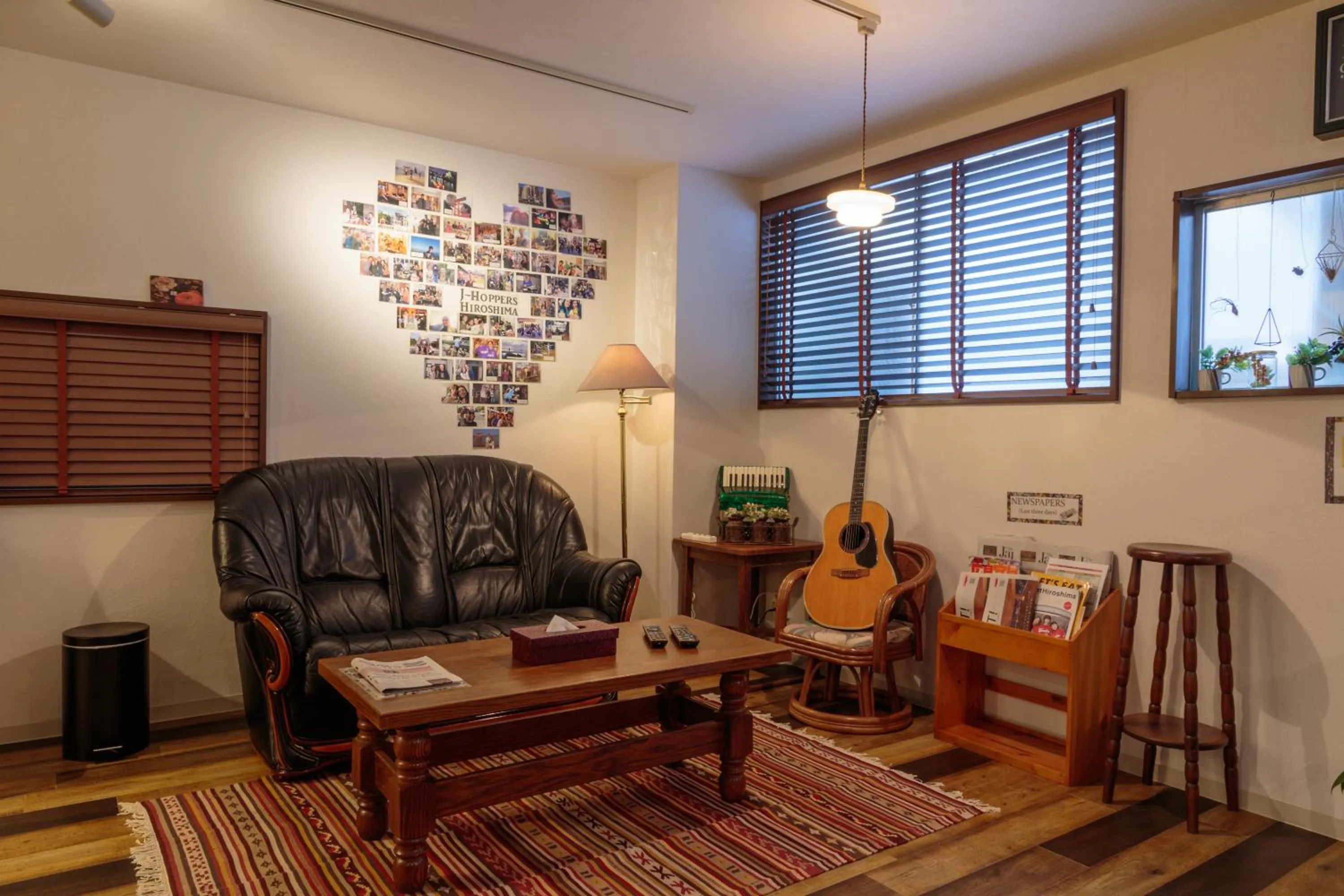 Communal lounge/ TV room in J-Hoppers Hiroshima Guesthouse
