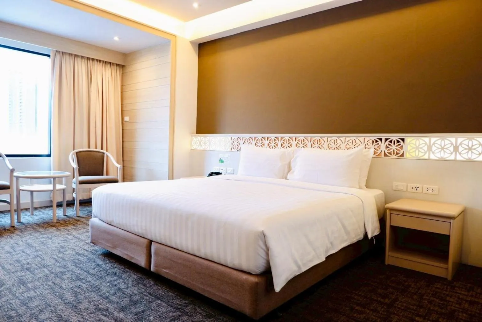 Bed in FuramaXclusive Pratunam Park Hotel