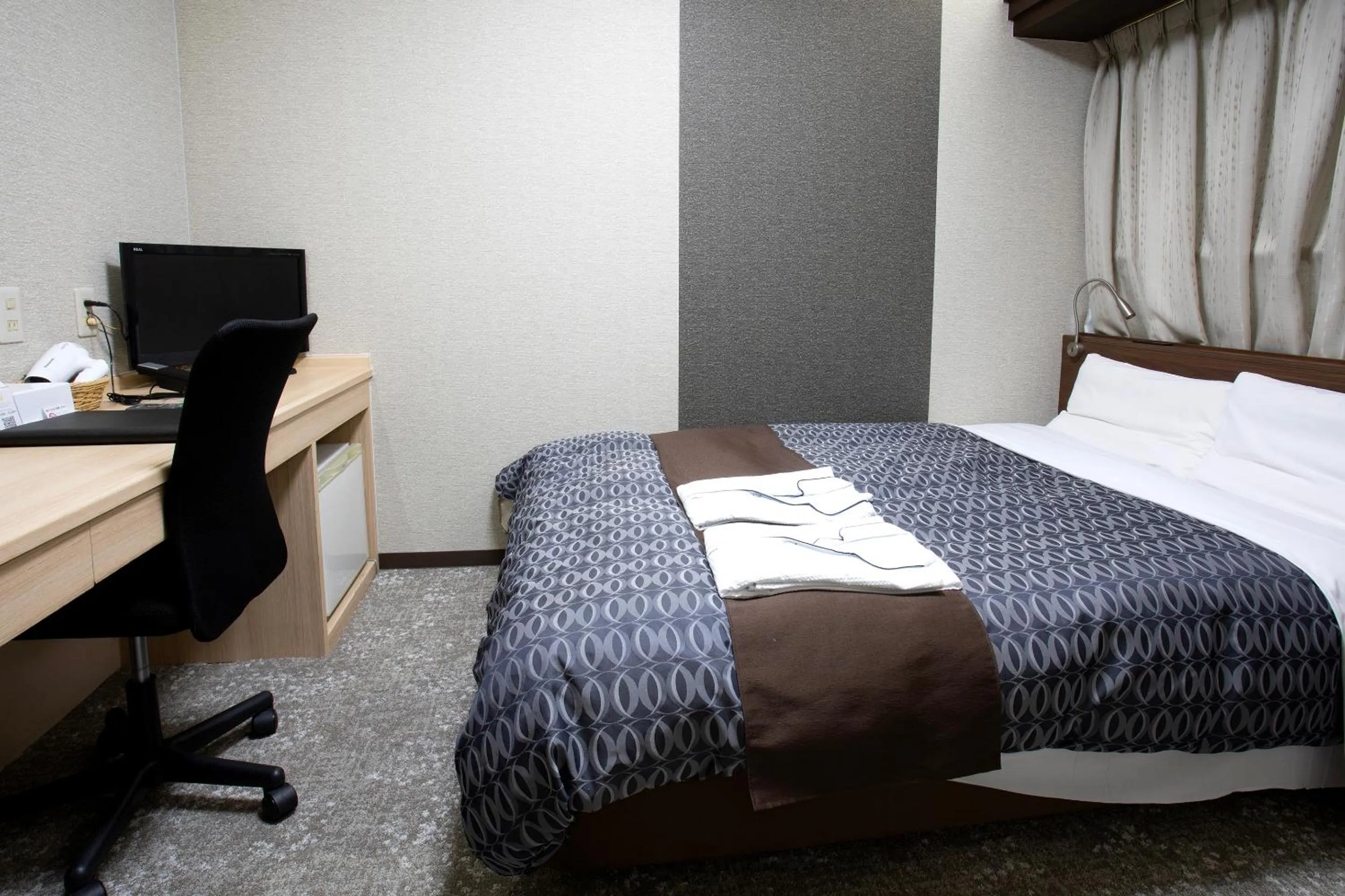 Bed in Nagasaki IK Hotel