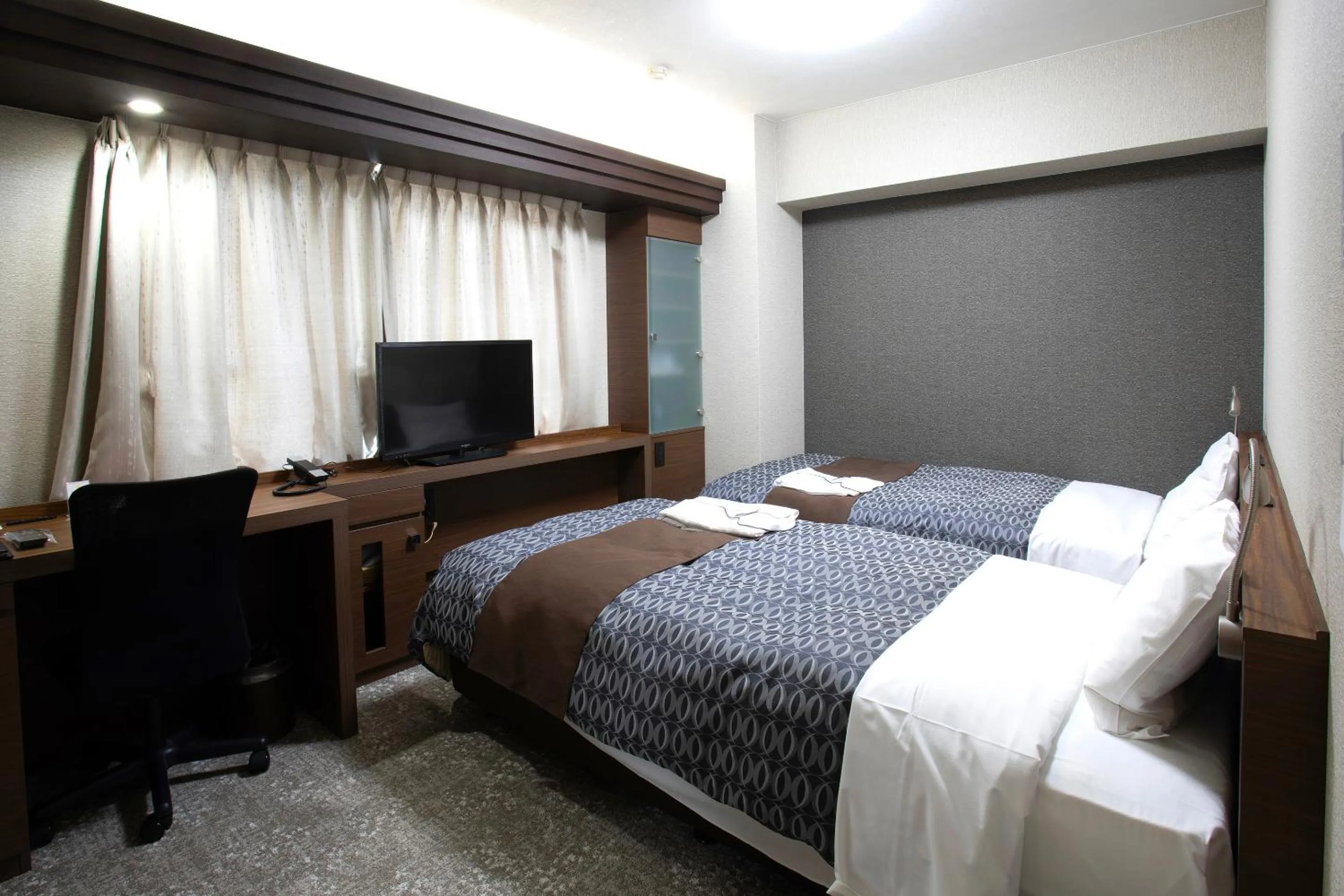 Bed in Nagasaki IK Hotel