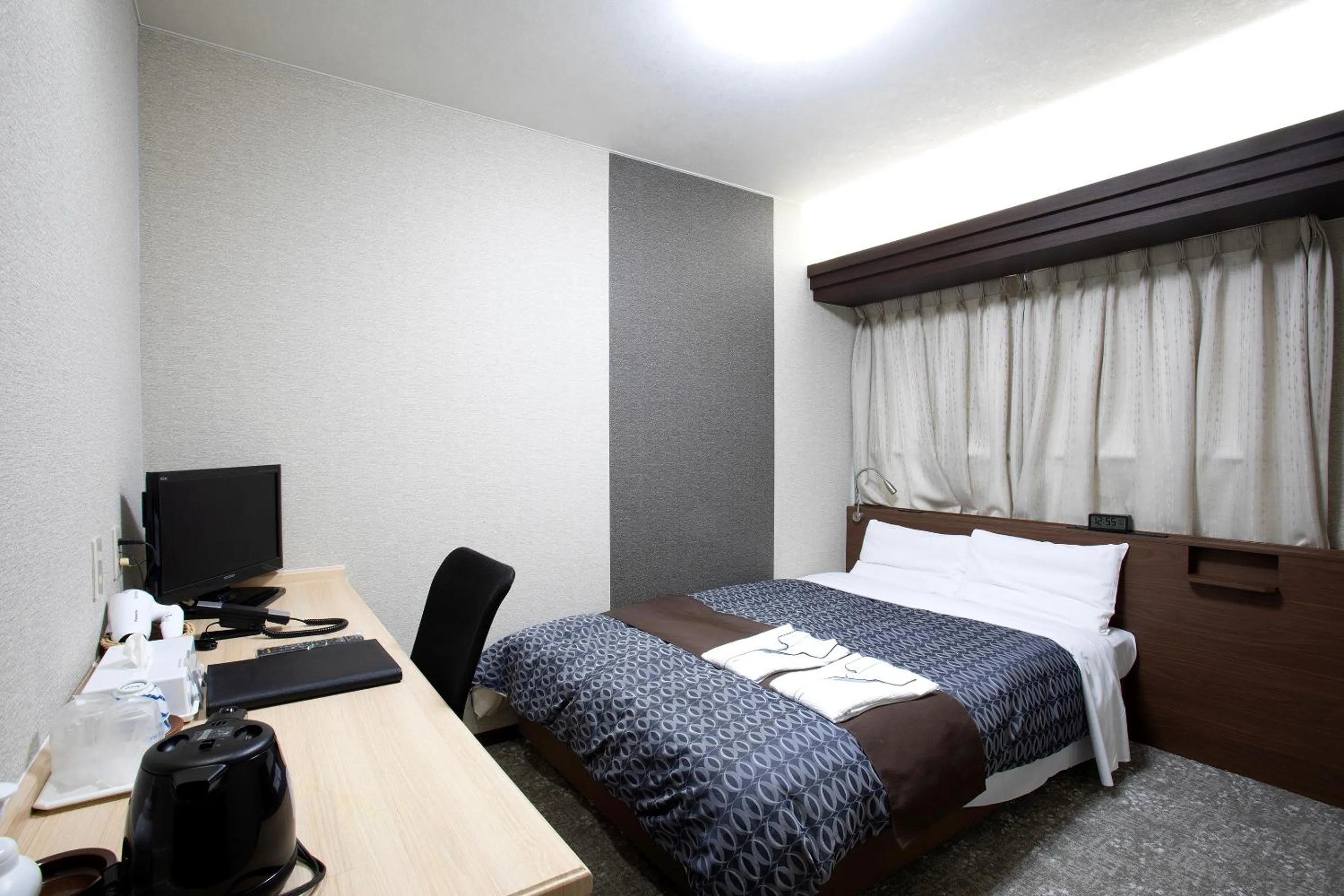 Bed in Nagasaki IK Hotel