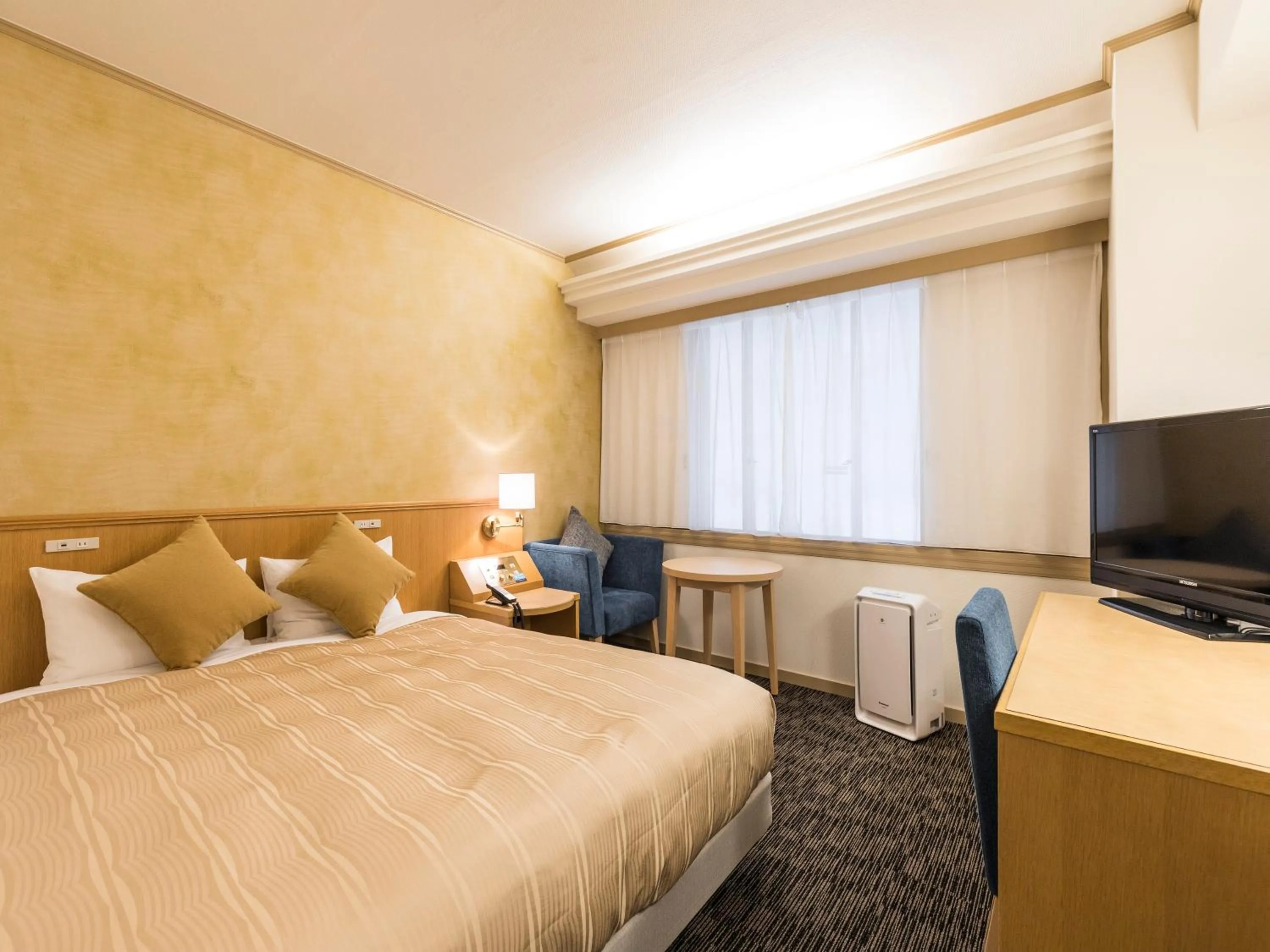 Photo of the whole room, Bed in Nishitetsu Inn Fukuoka