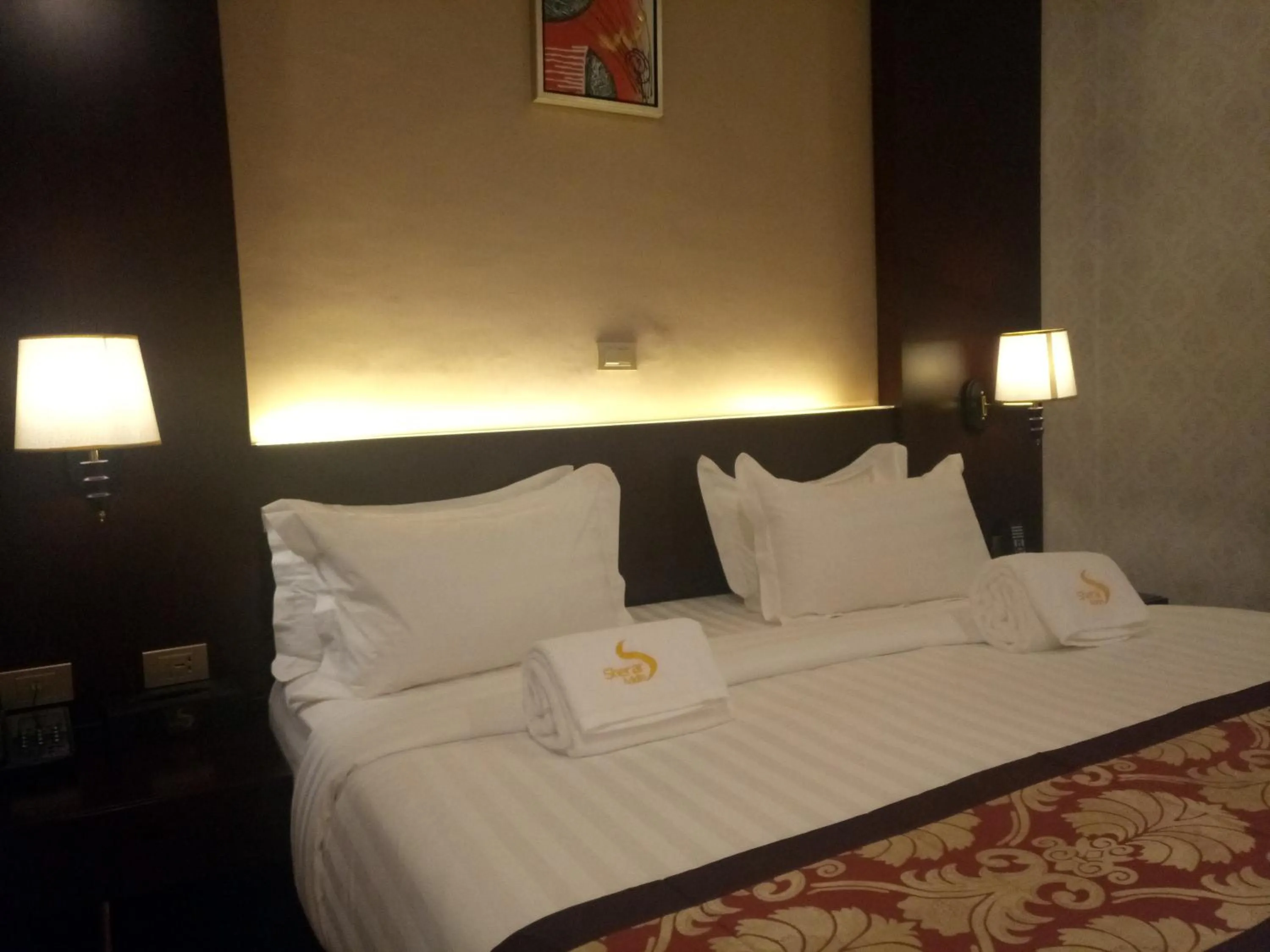 Bed in Sherar Addis Hotel