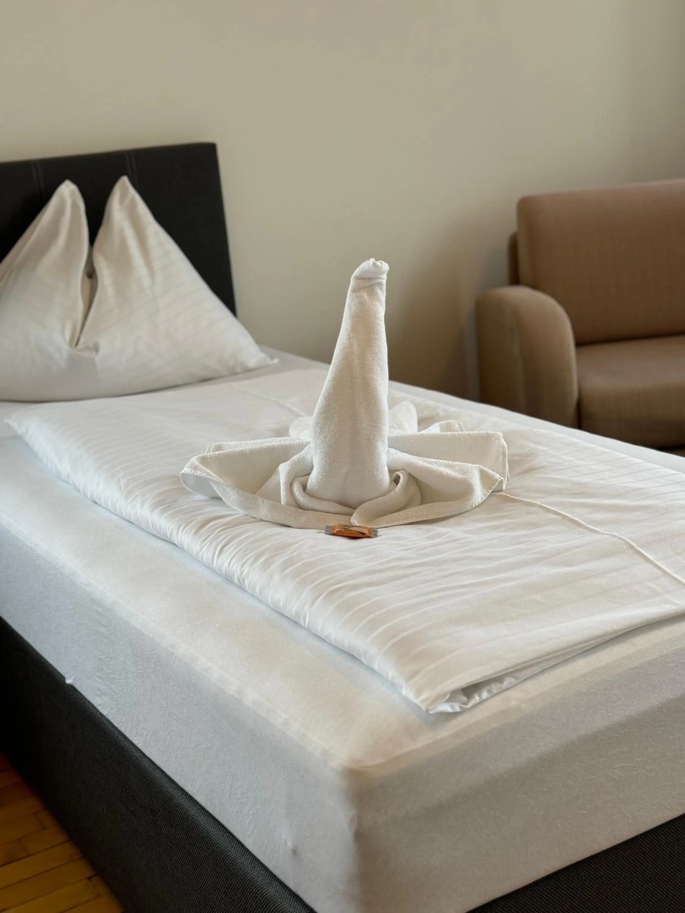 Bed in Stadthotel Schwerterbräu