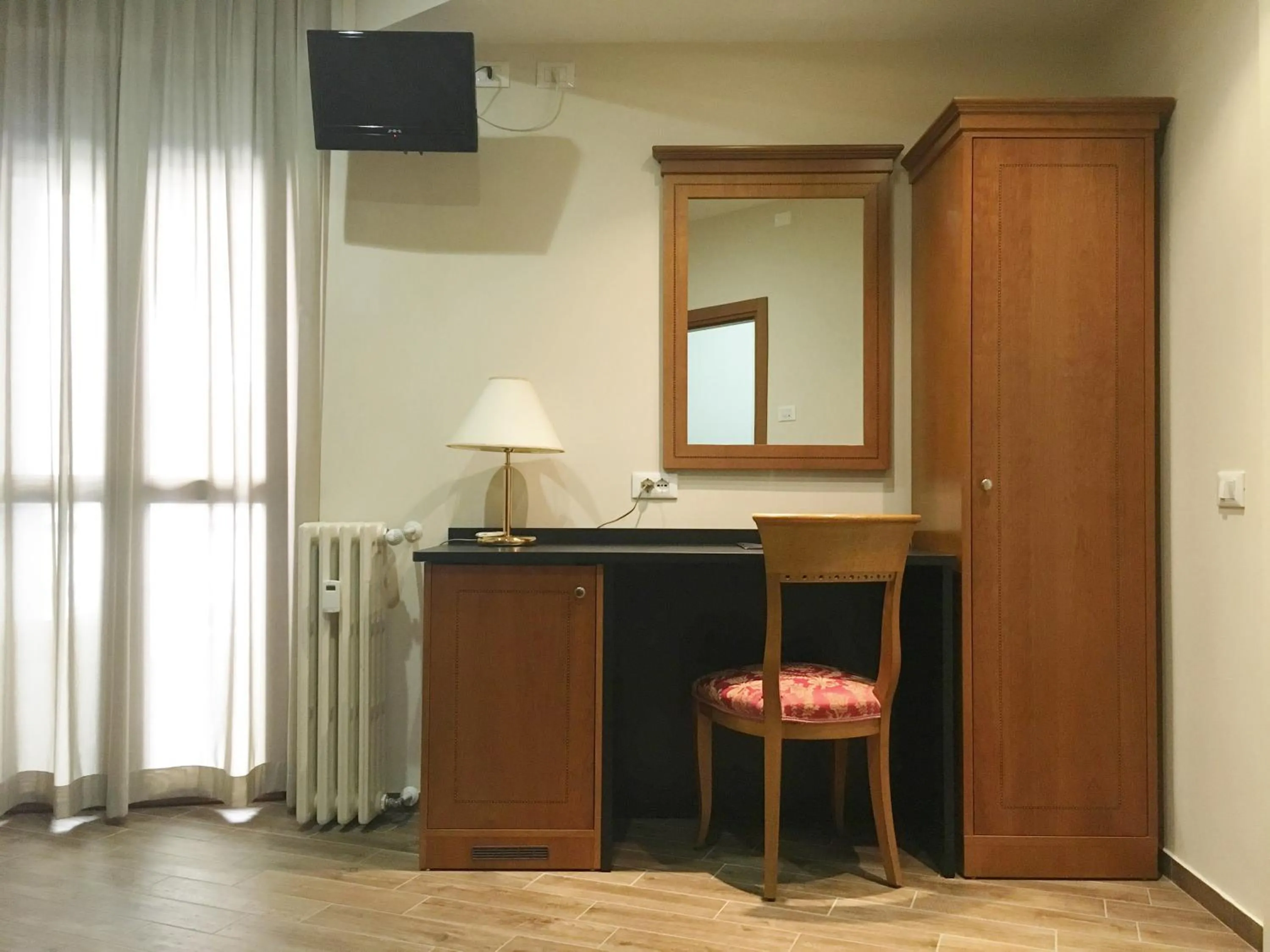 Seating area in Hotel Excelsior Pavia