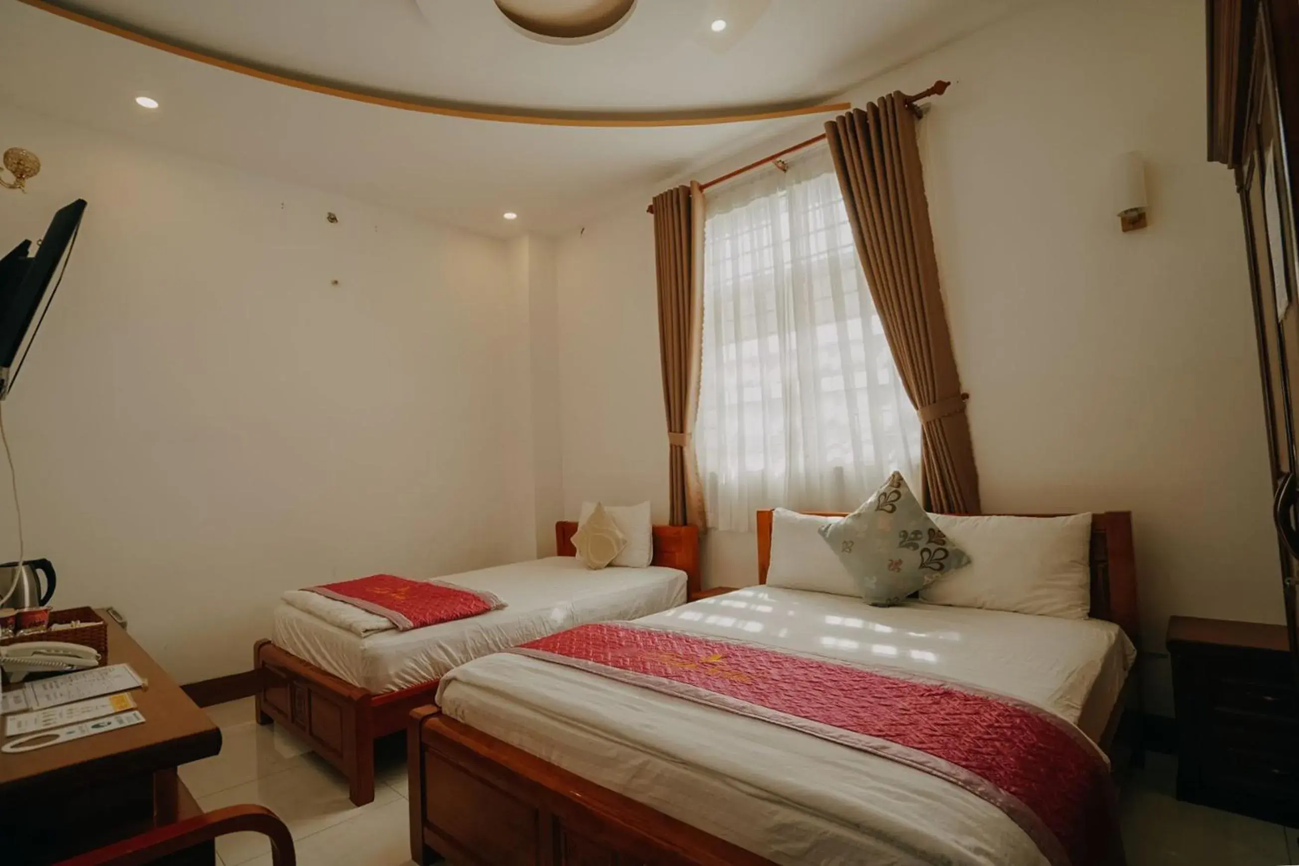 Standard Triple Room in Tulip Hotel Standard Triple Room in Tulip Hotel