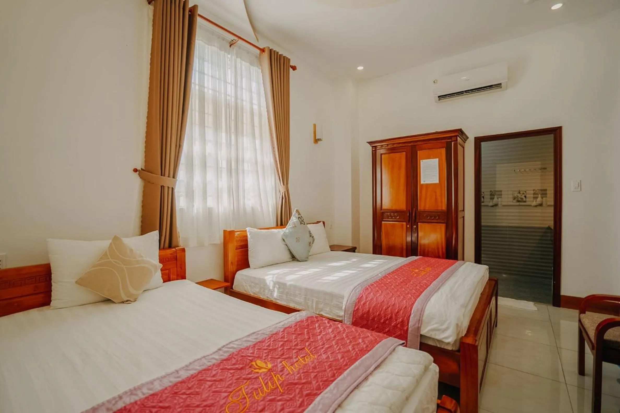 Photo of the whole room, Bed in Tulip Hotel