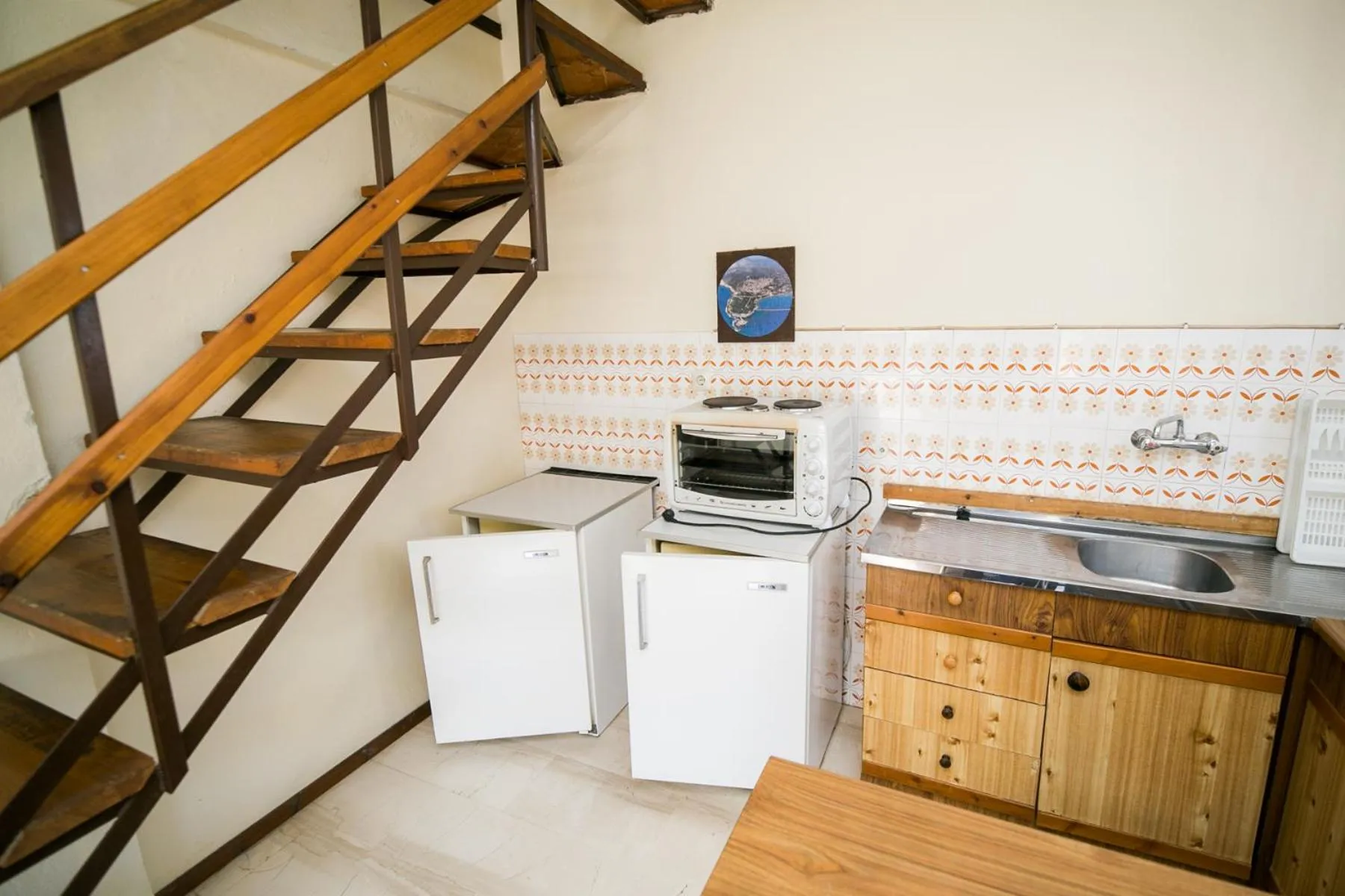 Kitchen or kitchenette in Apartments Hotel Magani