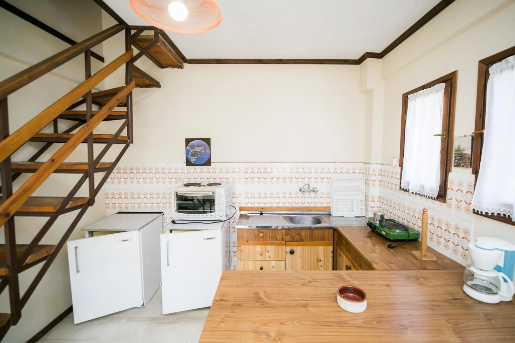 Kitchen or kitchenette in Apartments Hotel Magani