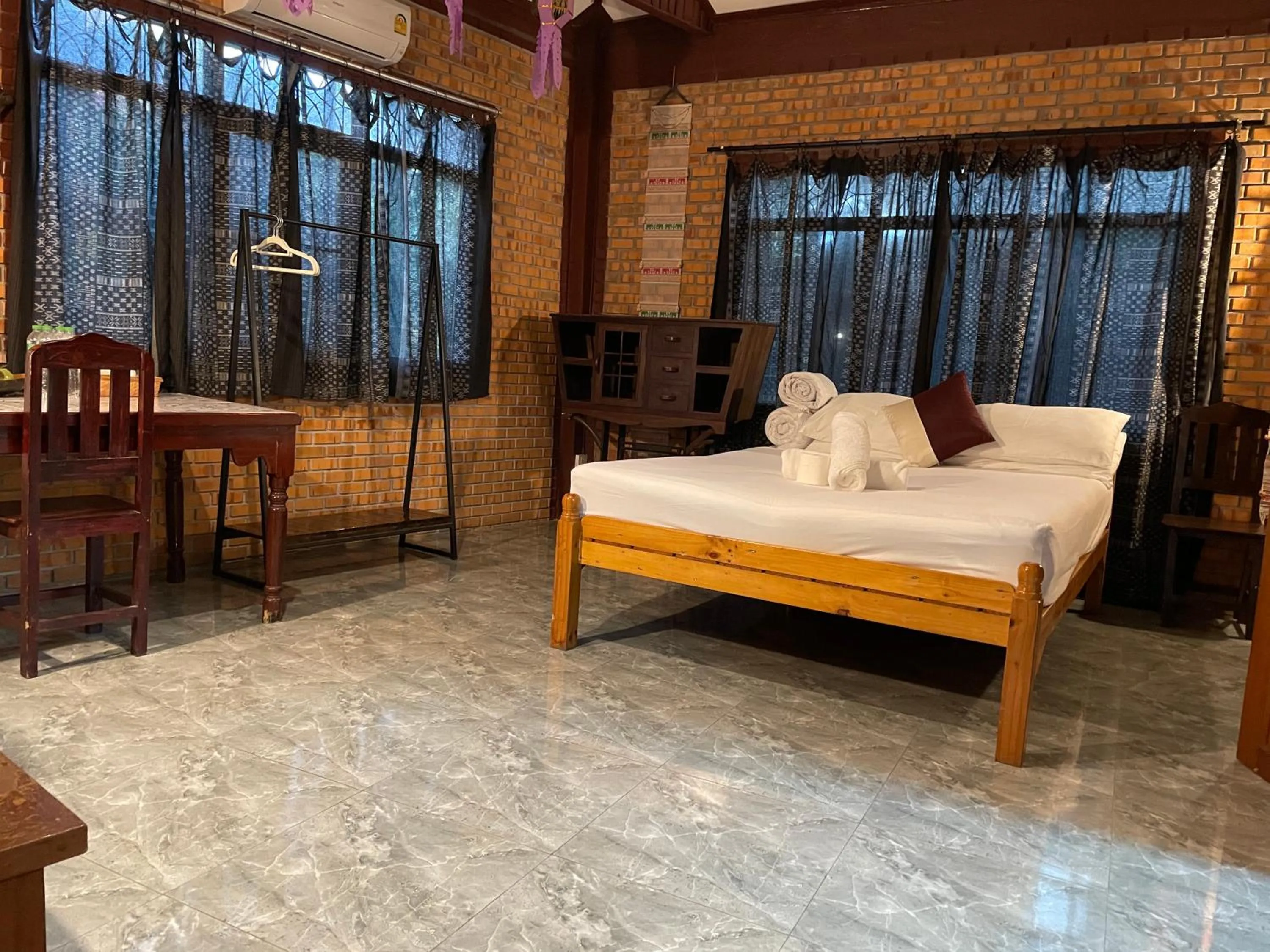 Living room, Bed in Boutique House Nipha