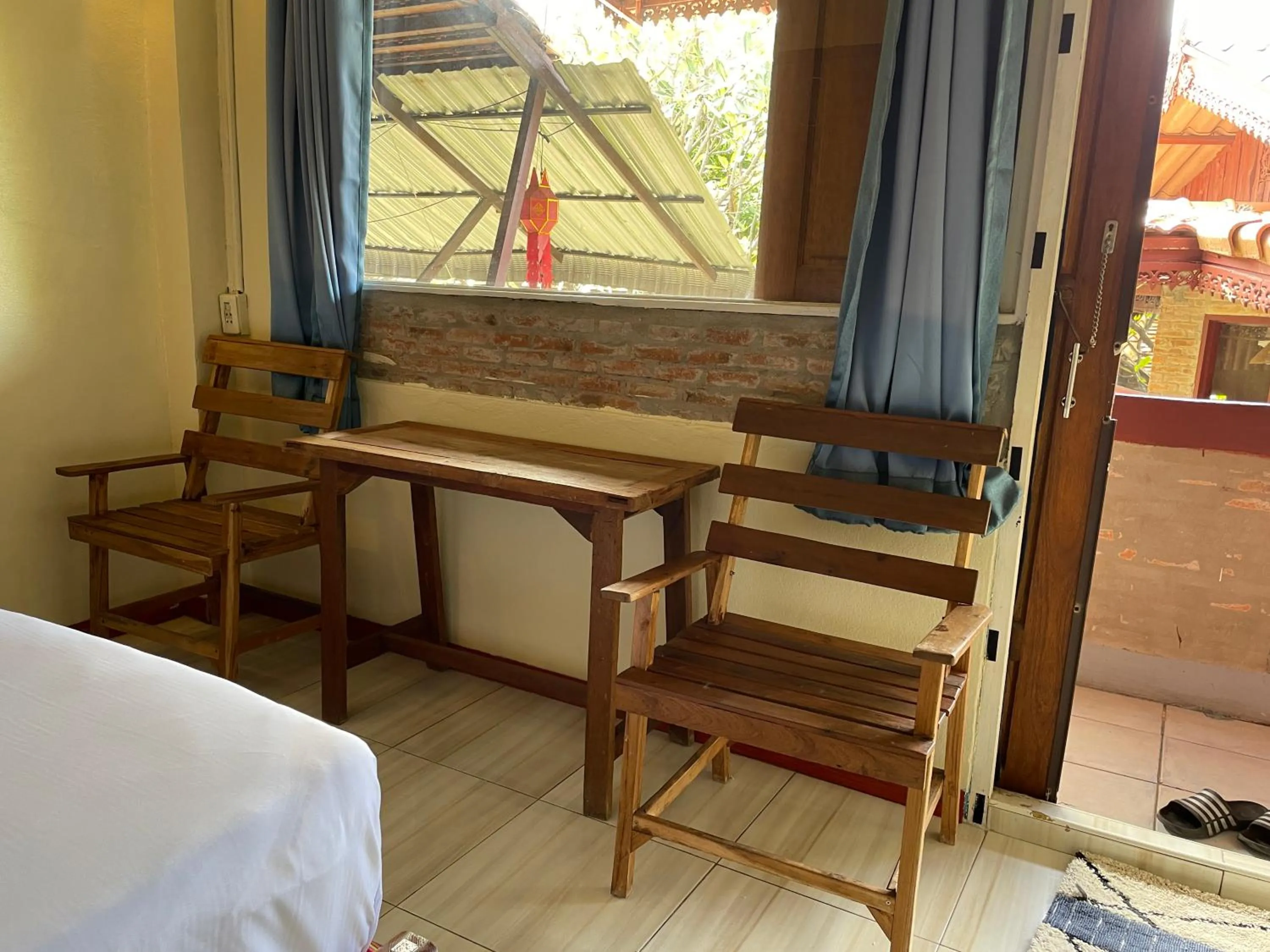 Living room, Bed in Boutique House Nipha