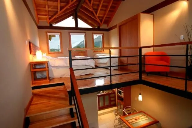 Bed in Aires del Beagle Apartment