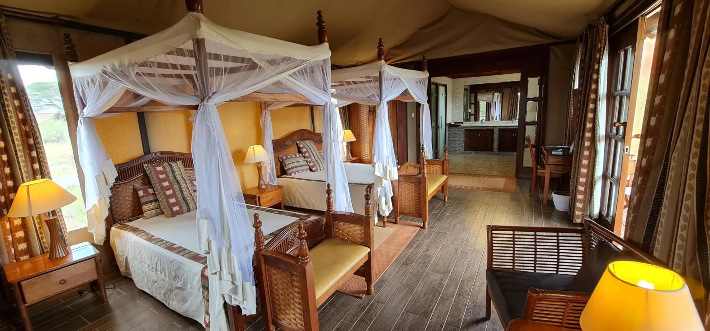 Bed in Kilima Safari Camp