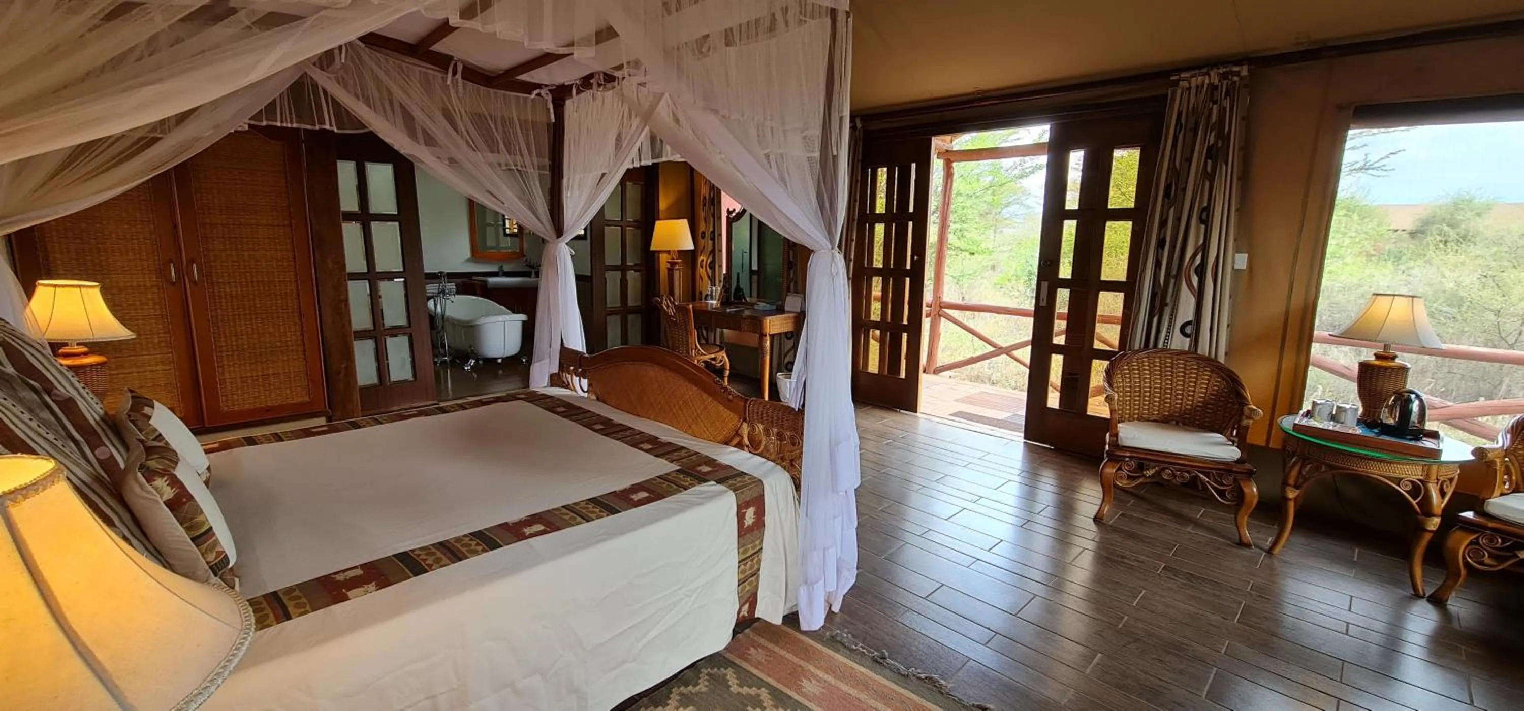 Bed in Kilima Safari Camp