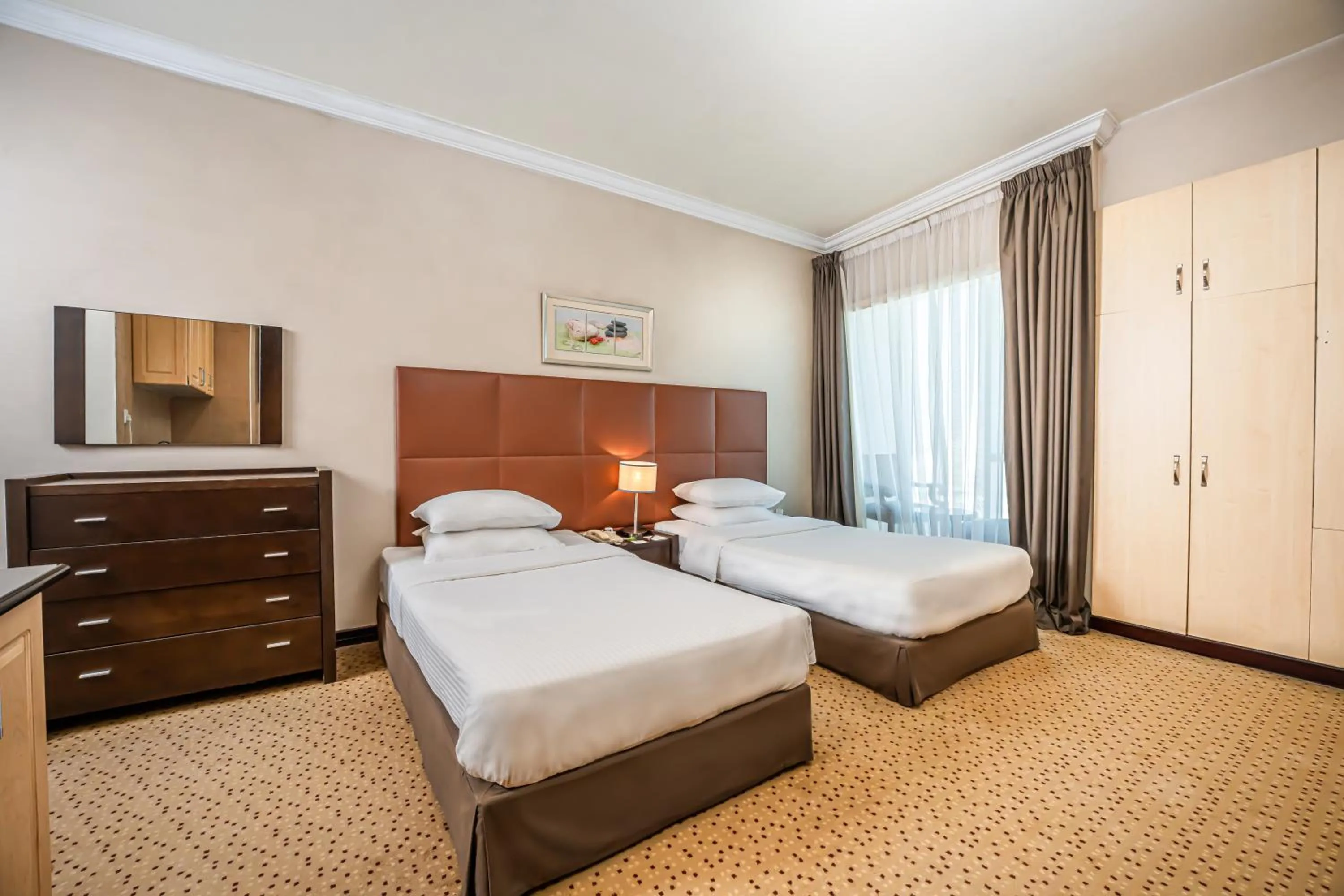 Bedroom, Bed in Kingsgate Hotel Doha by Millennium Hotels