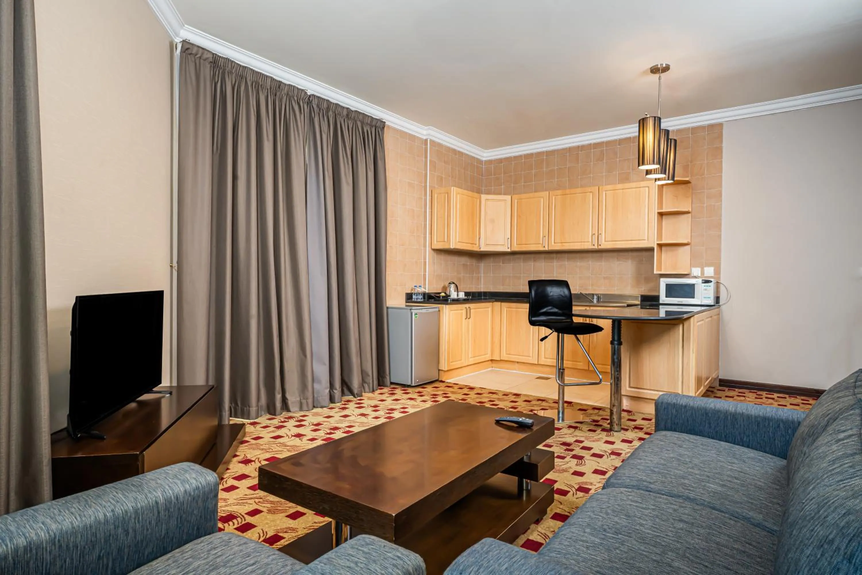 TV and multimedia in Kingsgate Hotel Doha by Millennium Hotels