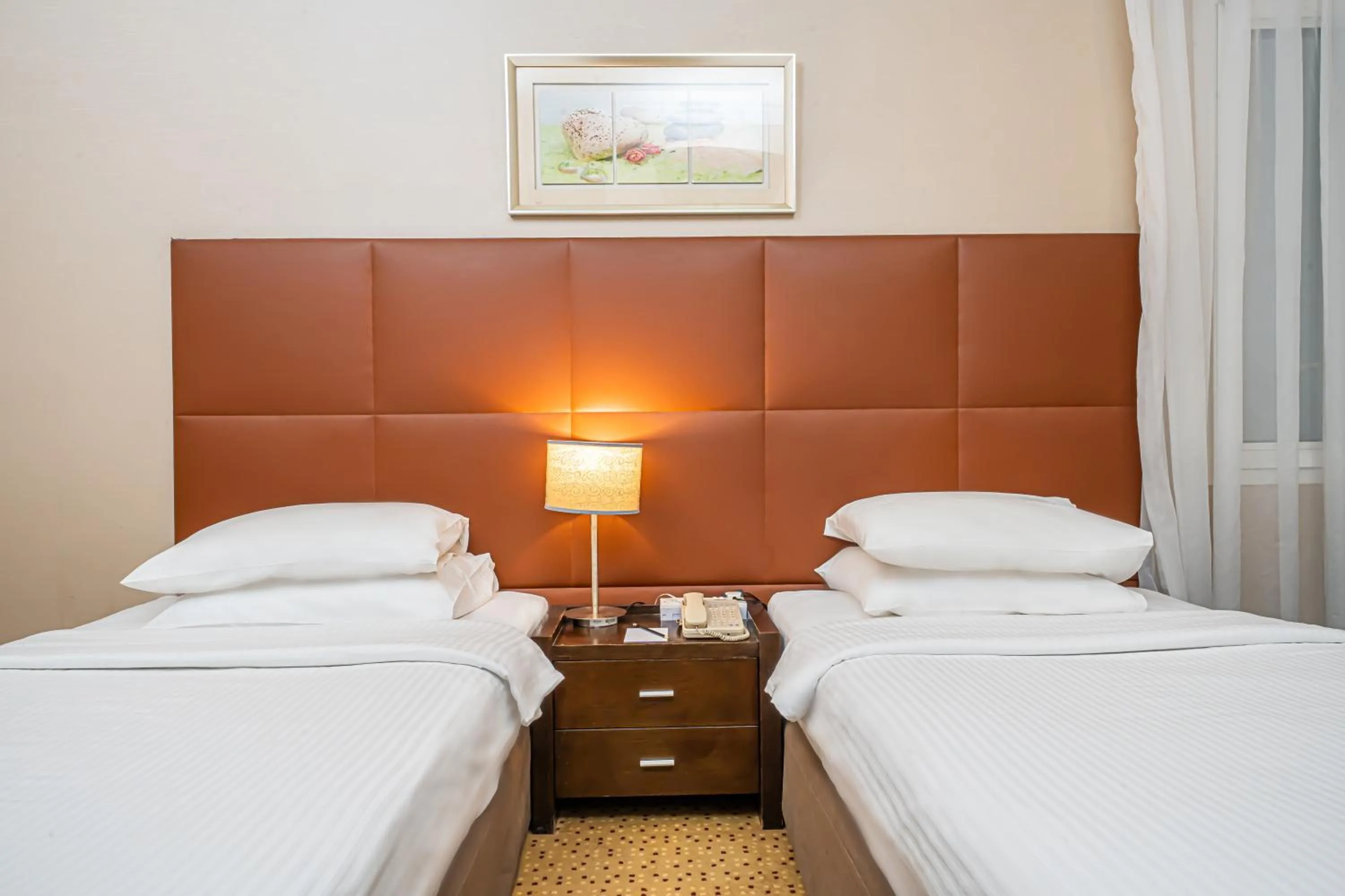 Bed in Kingsgate Hotel Doha by Millennium Hotels