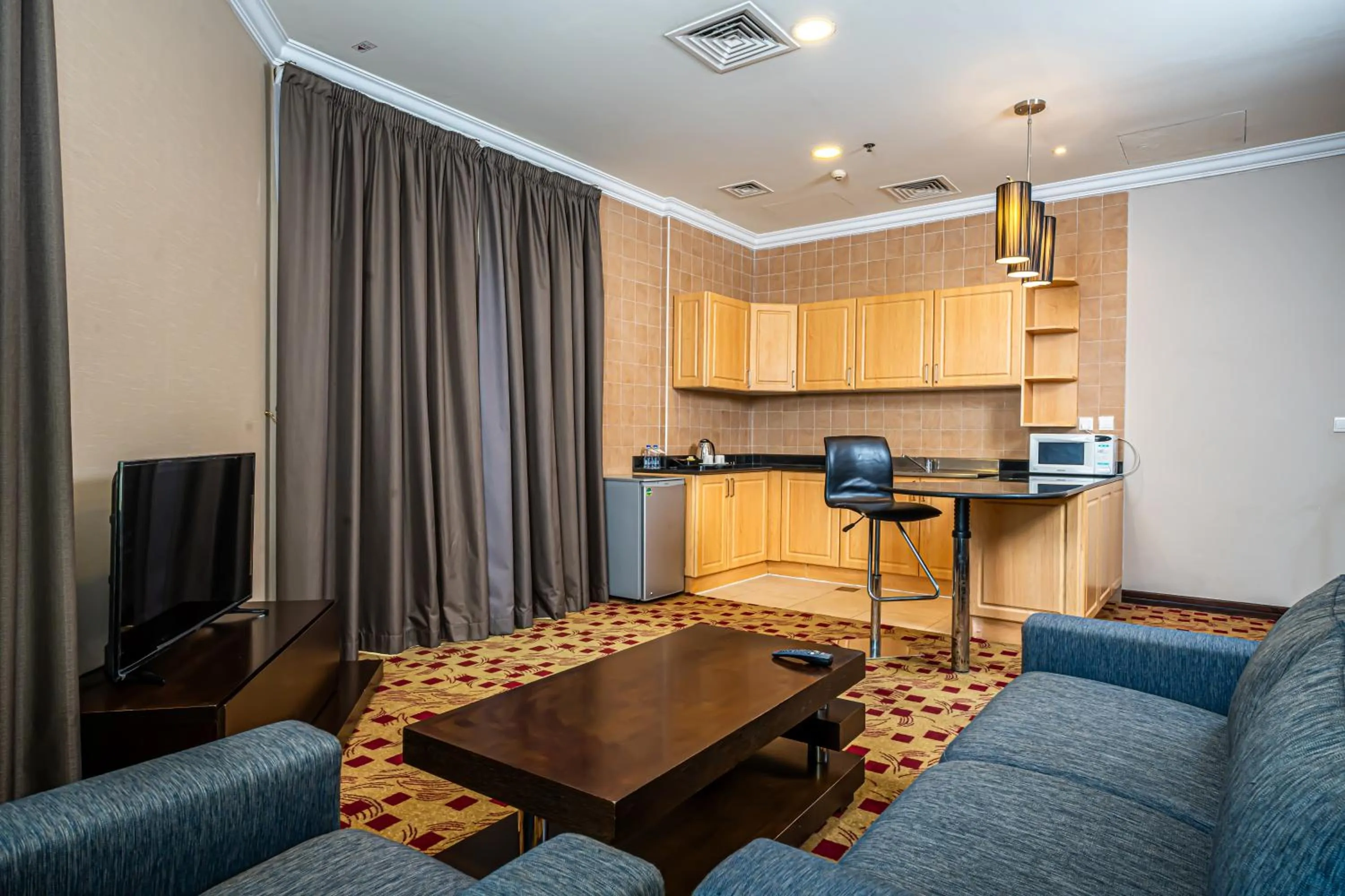 kitchen in Kingsgate Hotel Doha by Millennium Hotels