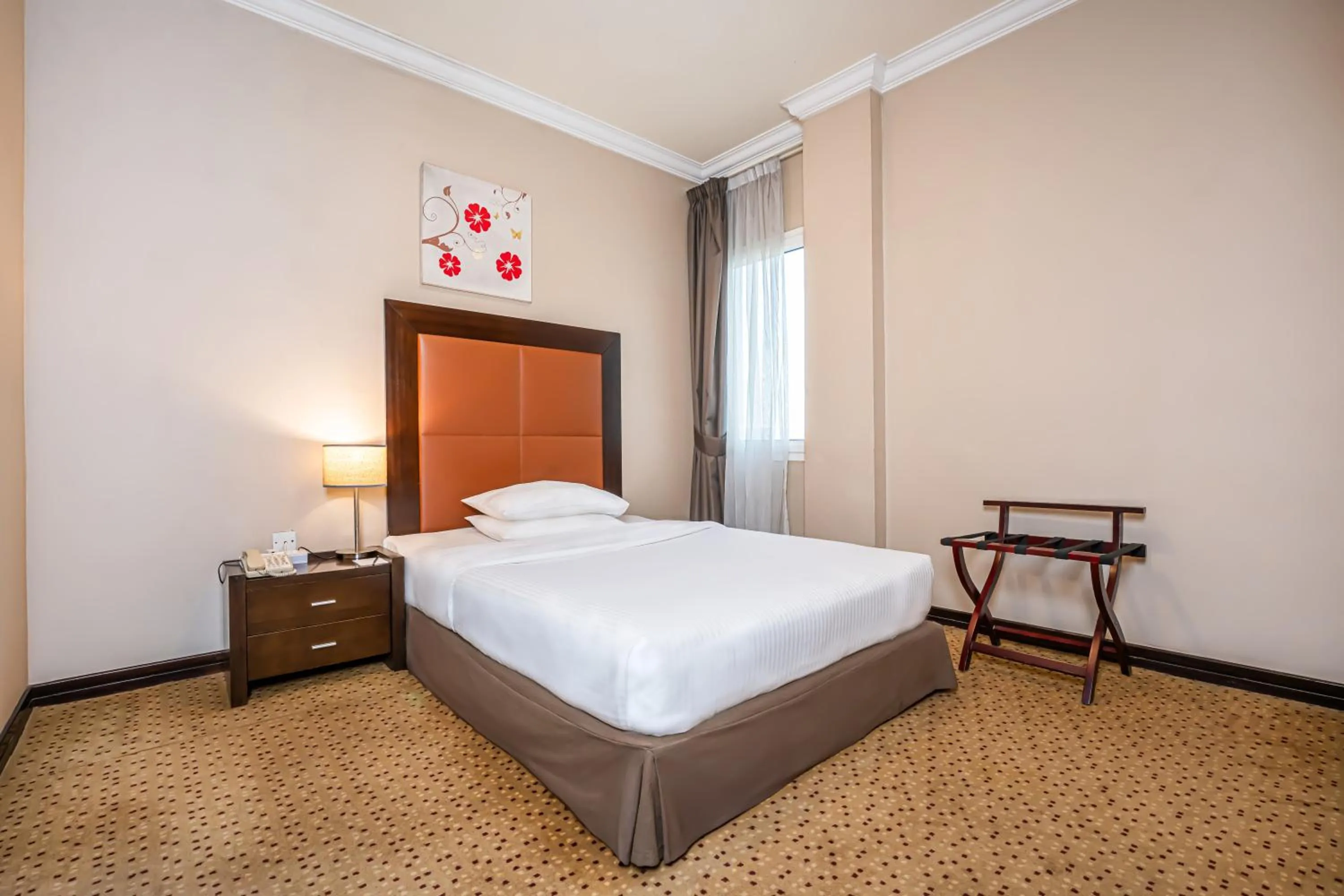 Bed in Kingsgate Hotel Doha by Millennium Hotels