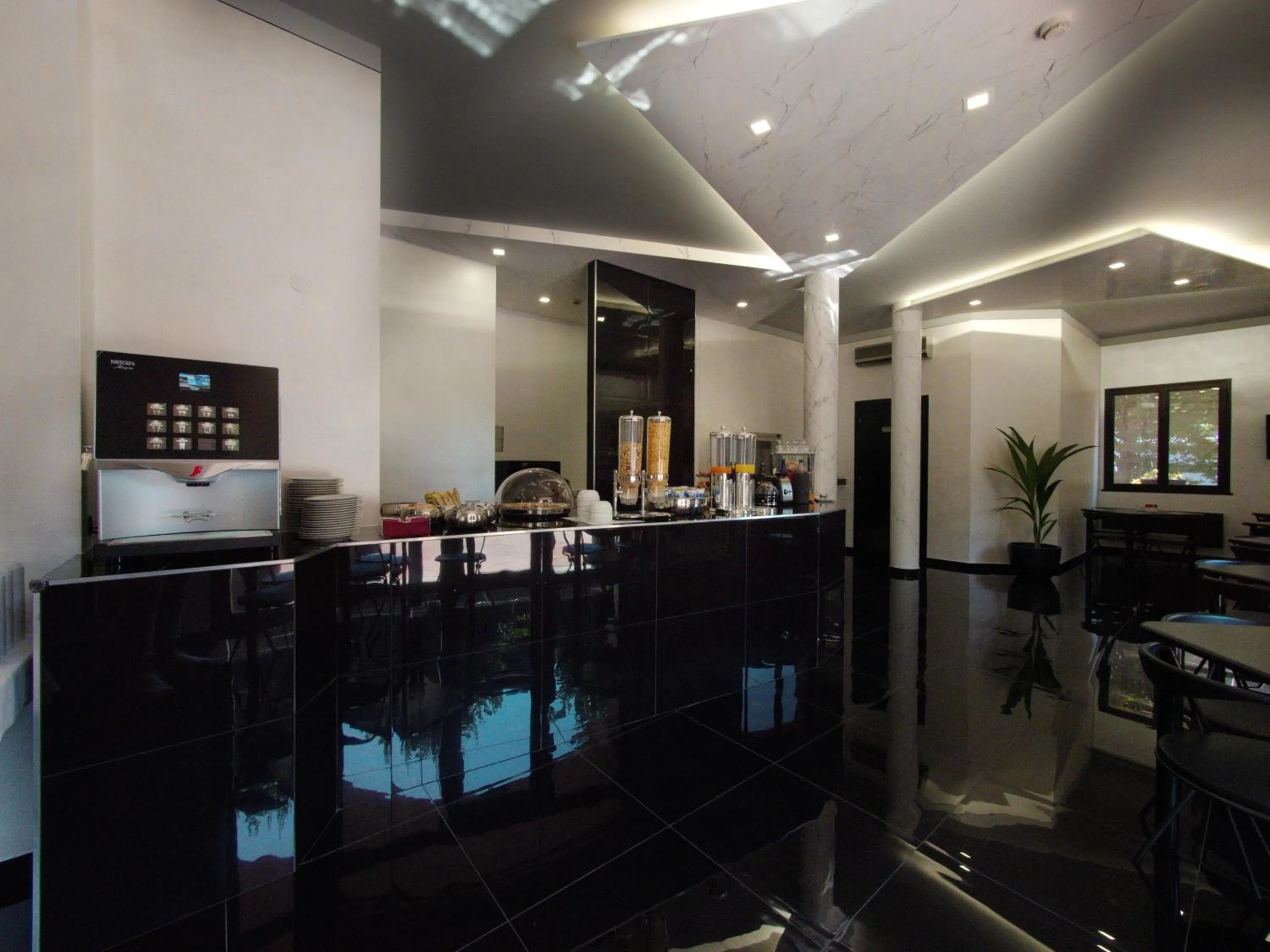 Lounge or bar in Hotel Versailles