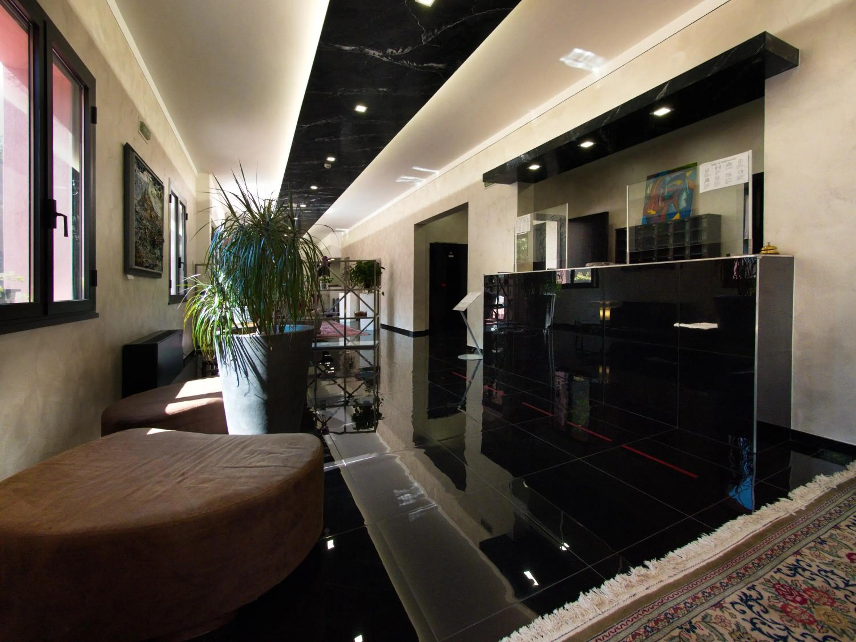 Lobby or reception in Hotel Versailles