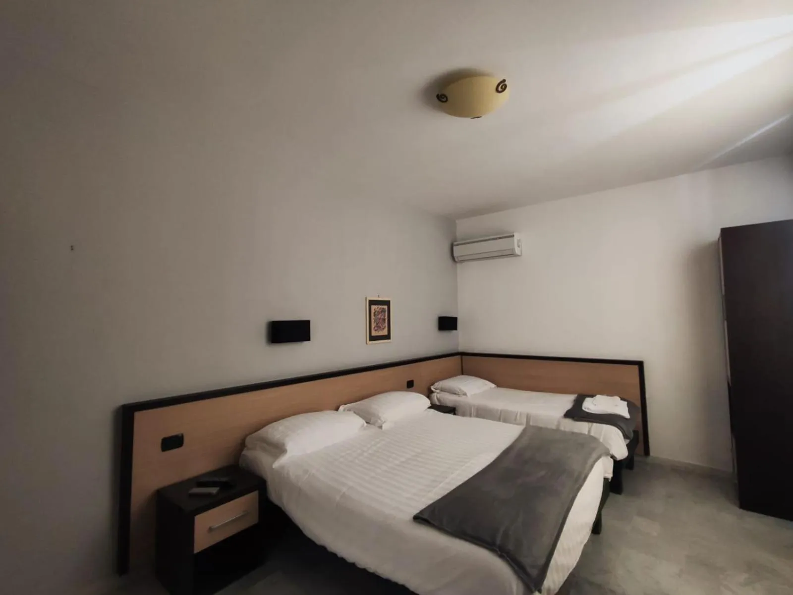 Bed in Hotel Quadrifoglio