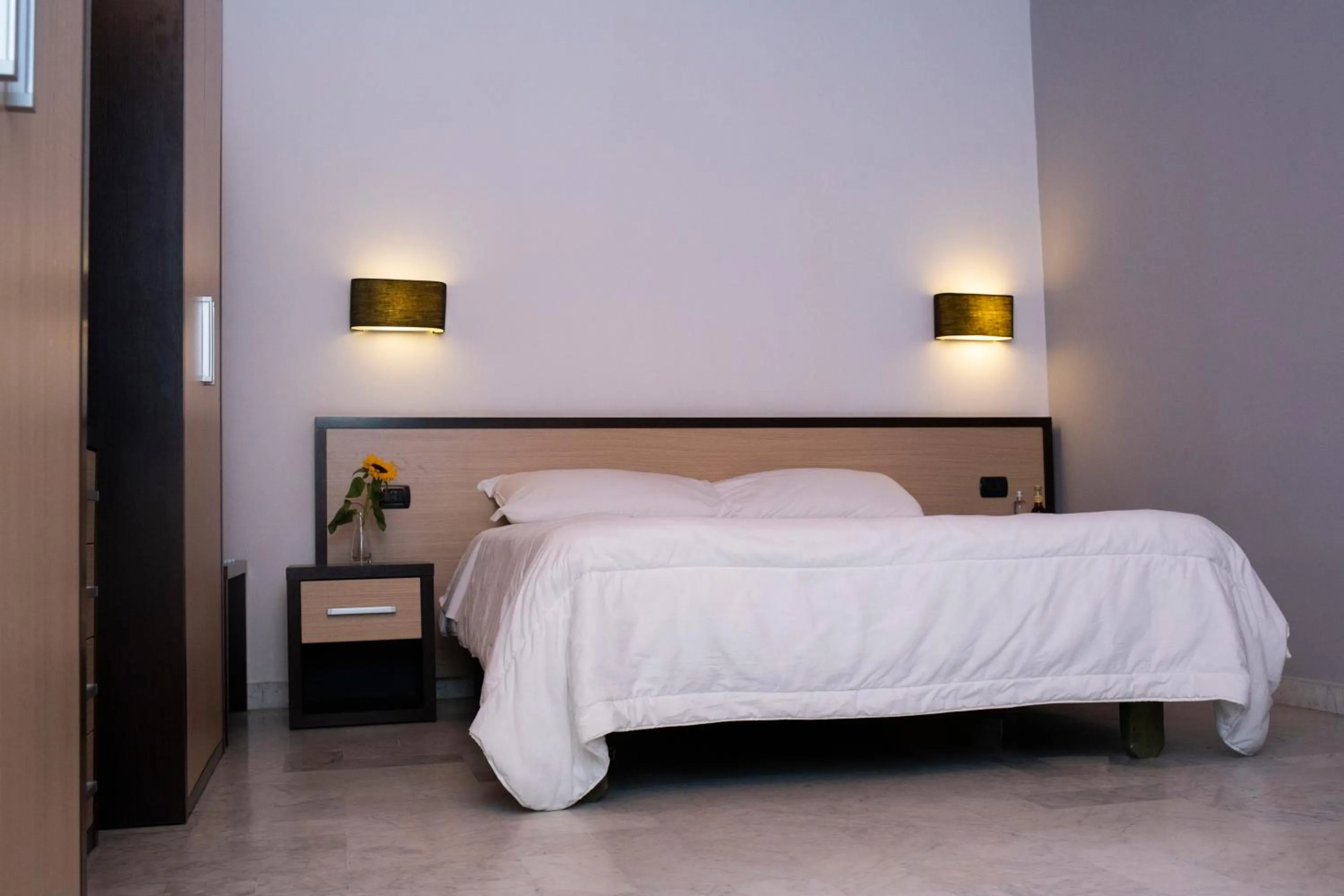 Bed in Hotel Quadrifoglio