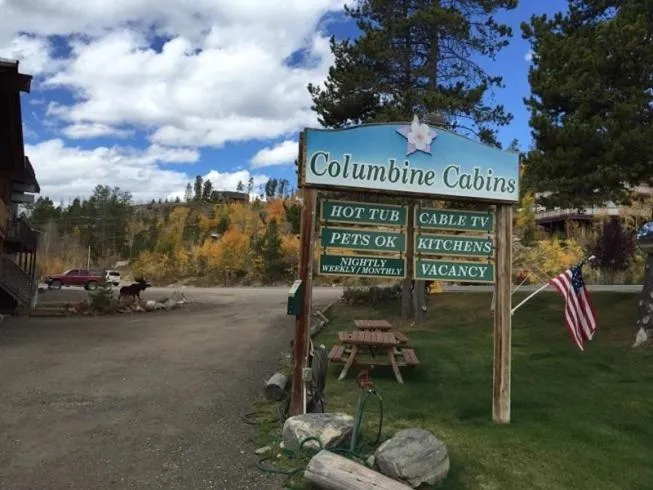 Property logo or sign in Columbine Cabins