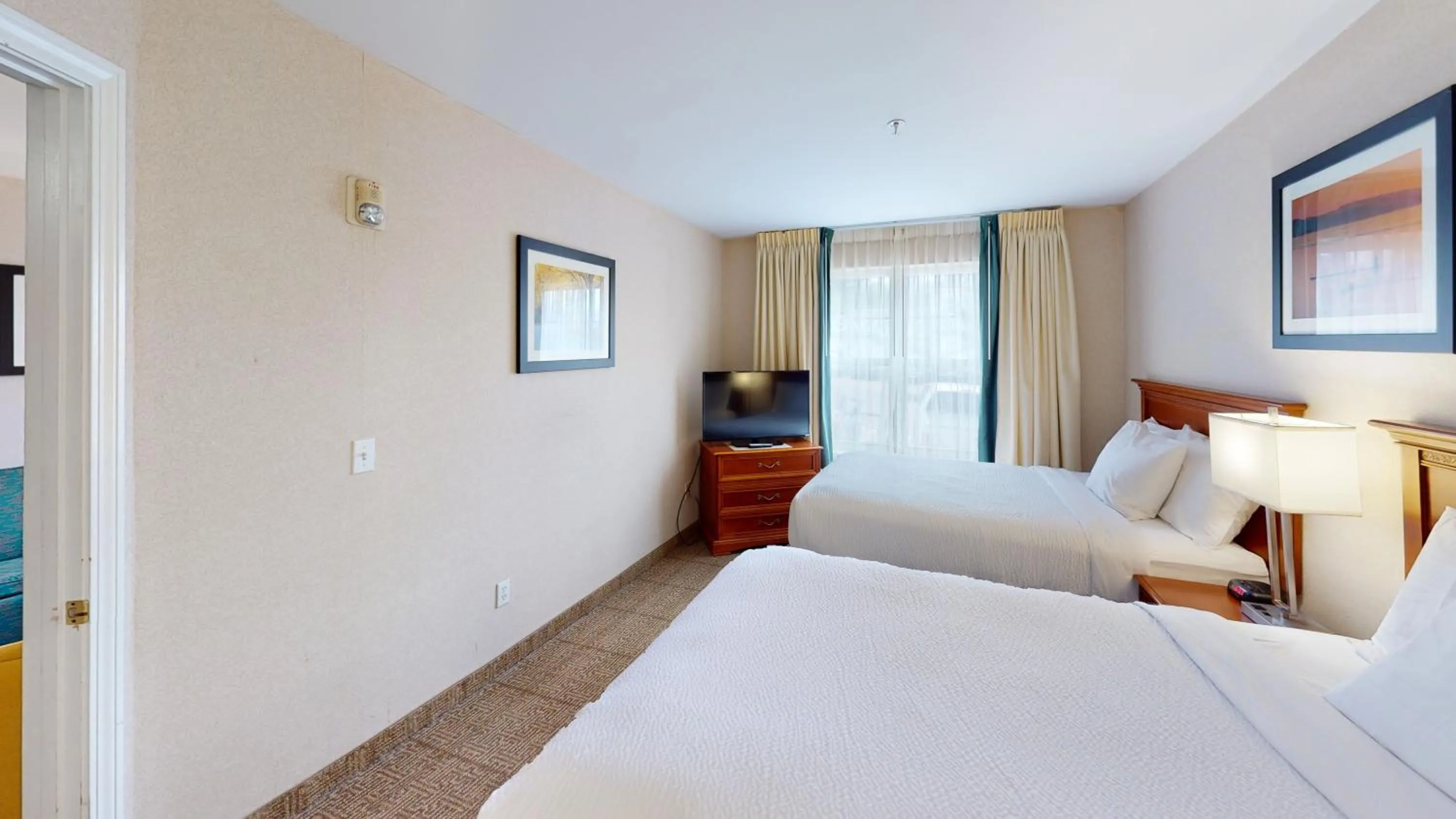 Bedroom, Bed in Smart Suites, an Ascend Collection Hotel