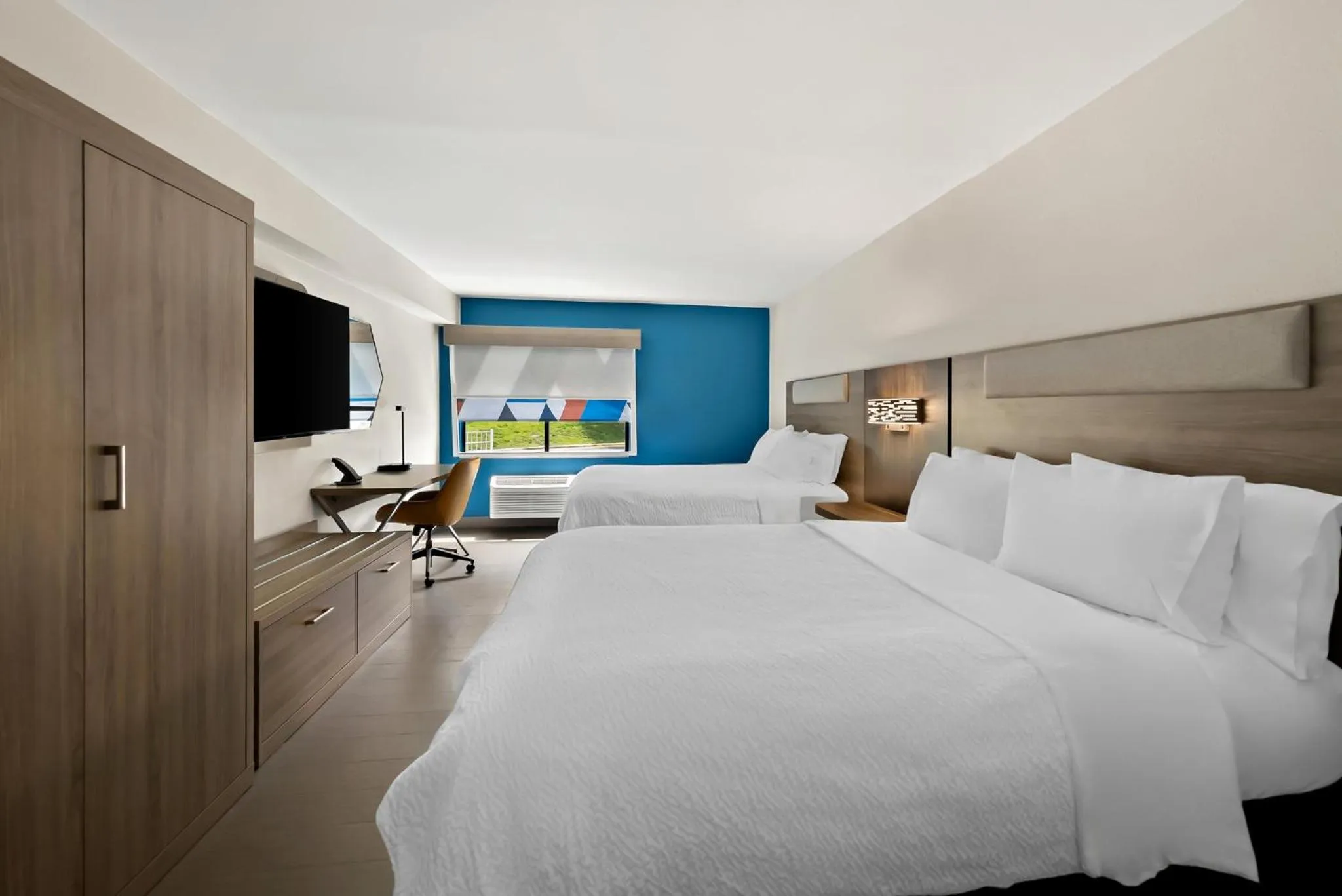 Photo of the whole room, Bed in Holiday Inn Express & Suites Raleigh NE - Medical Ctr Area by IHG