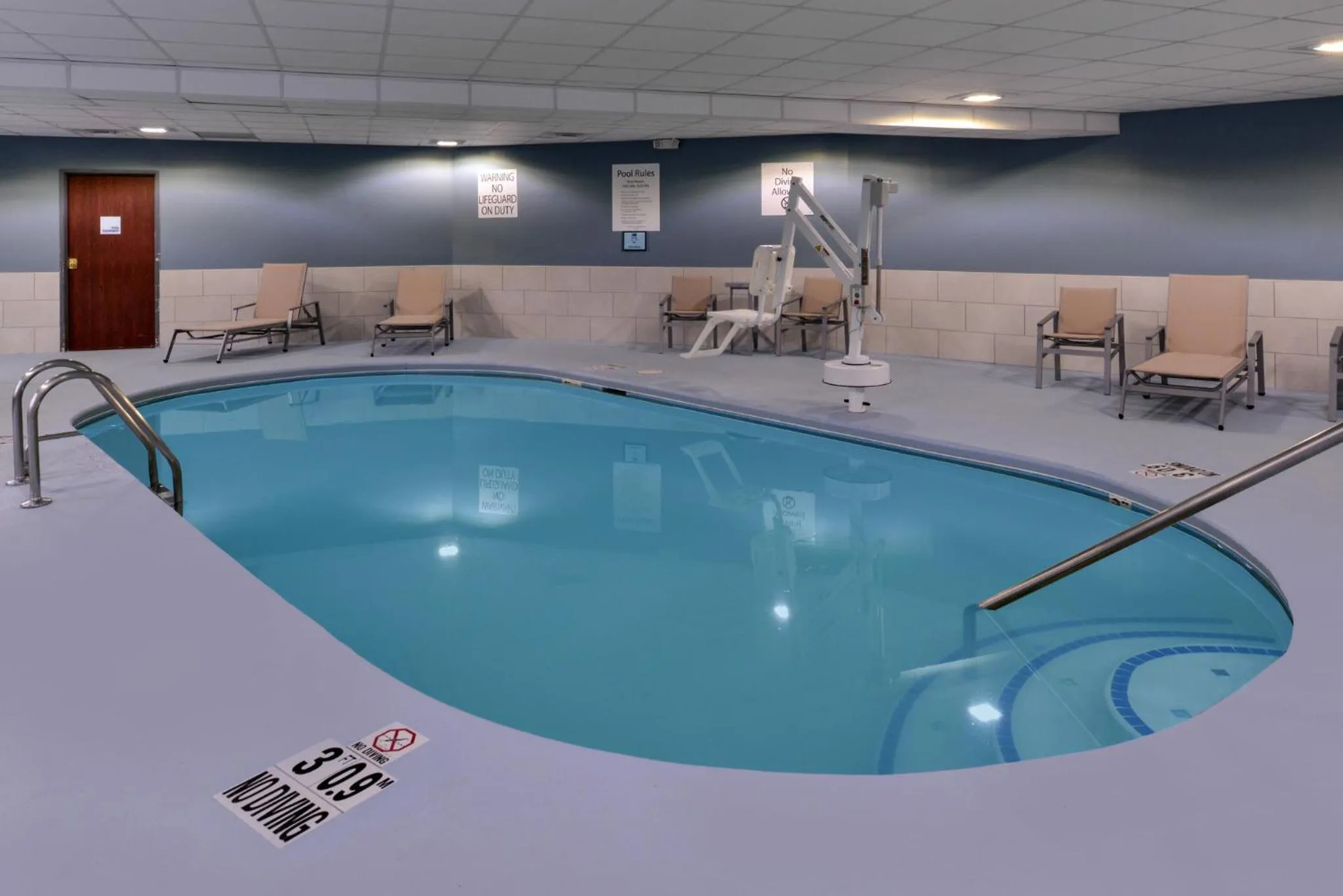 Swimming pool in Holiday Inn Express & Suites Raleigh NE - Medical Ctr Area by IHG