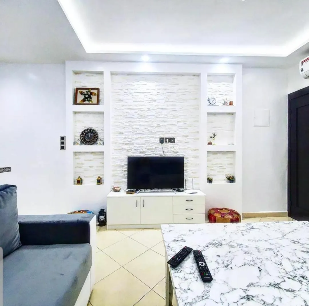 Communal lounge/ TV room in Modern Flat with sea view