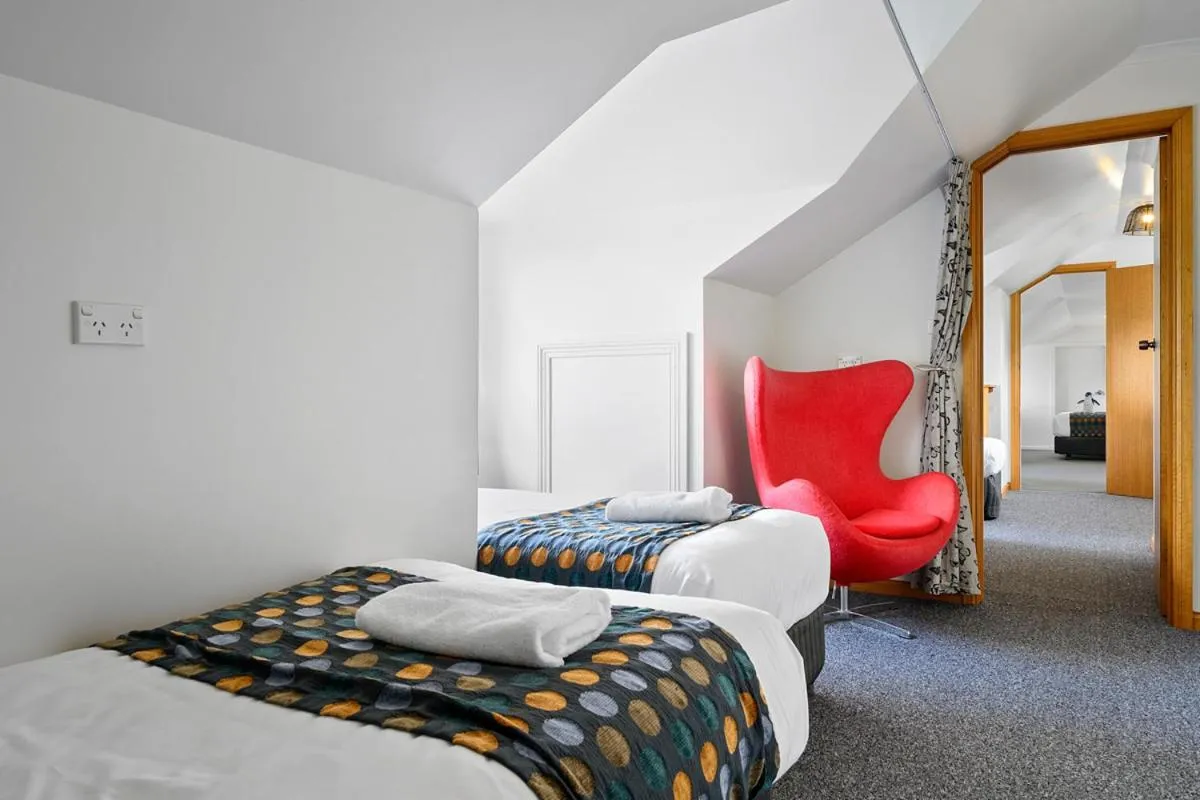 Bed in Stanley Seaview Inn