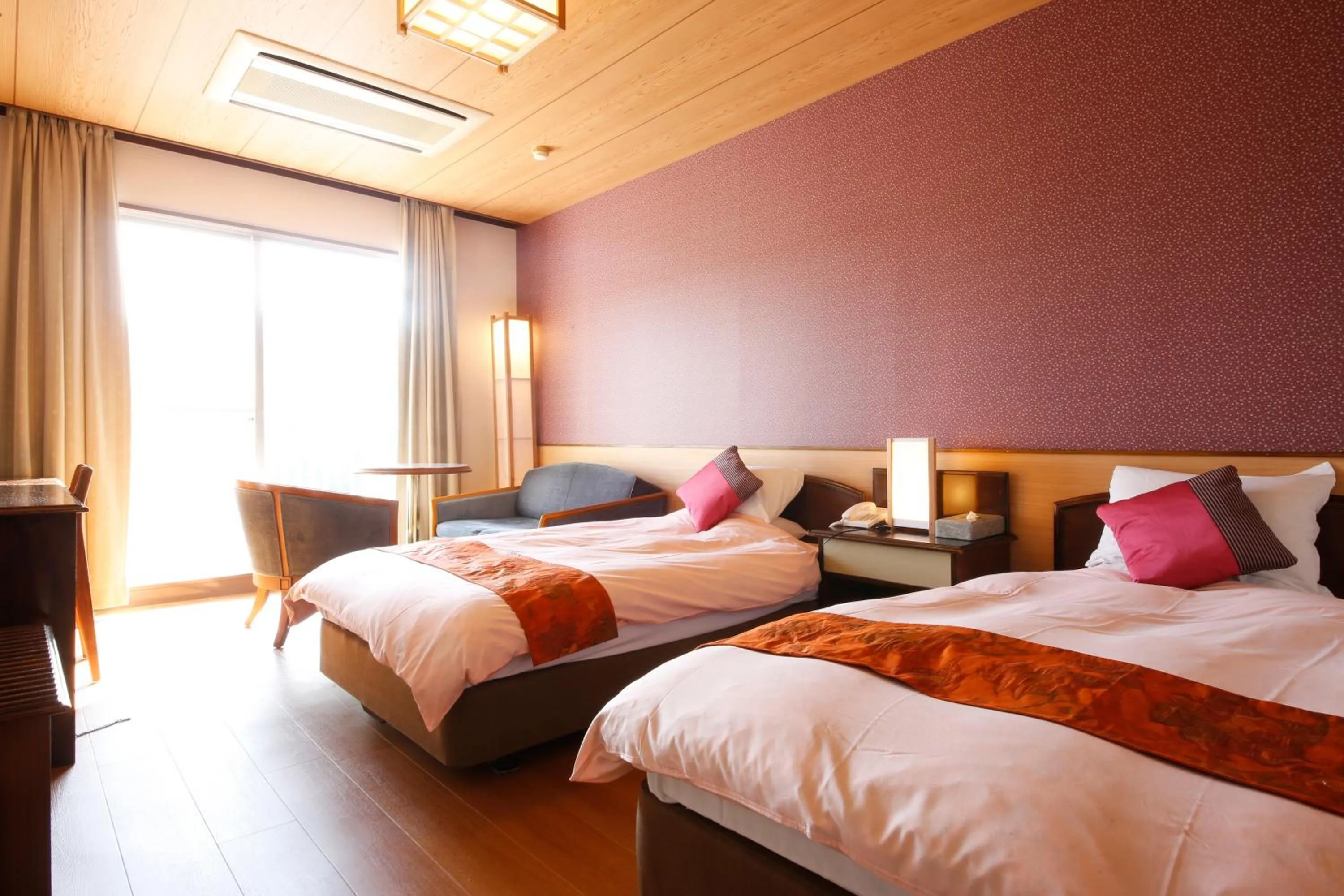 Bed in Hinotani Onsen Misugi Resort